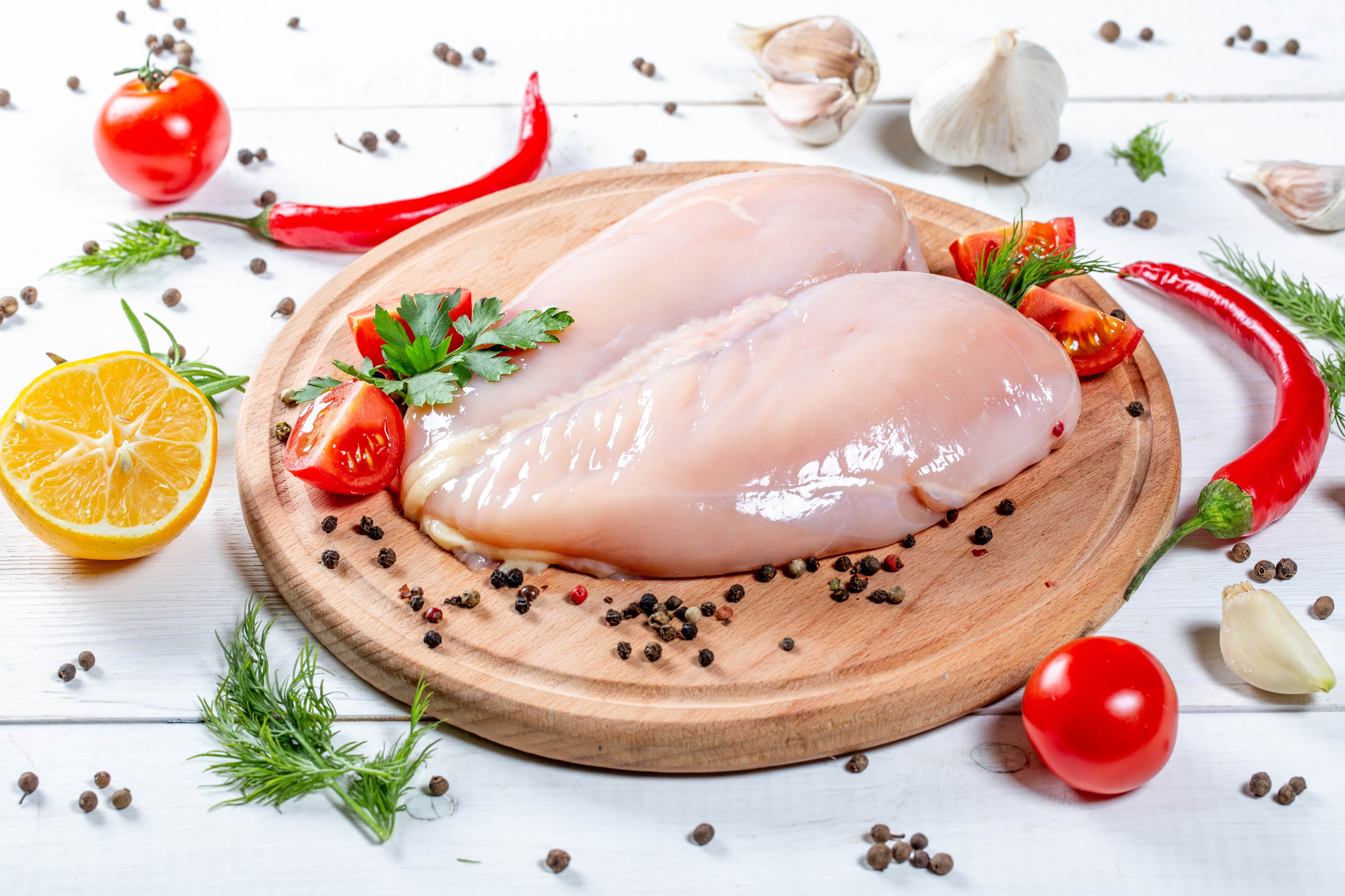 Fresh Chicken Breasts with Spices and Vegetables 4K HD Wallpaper