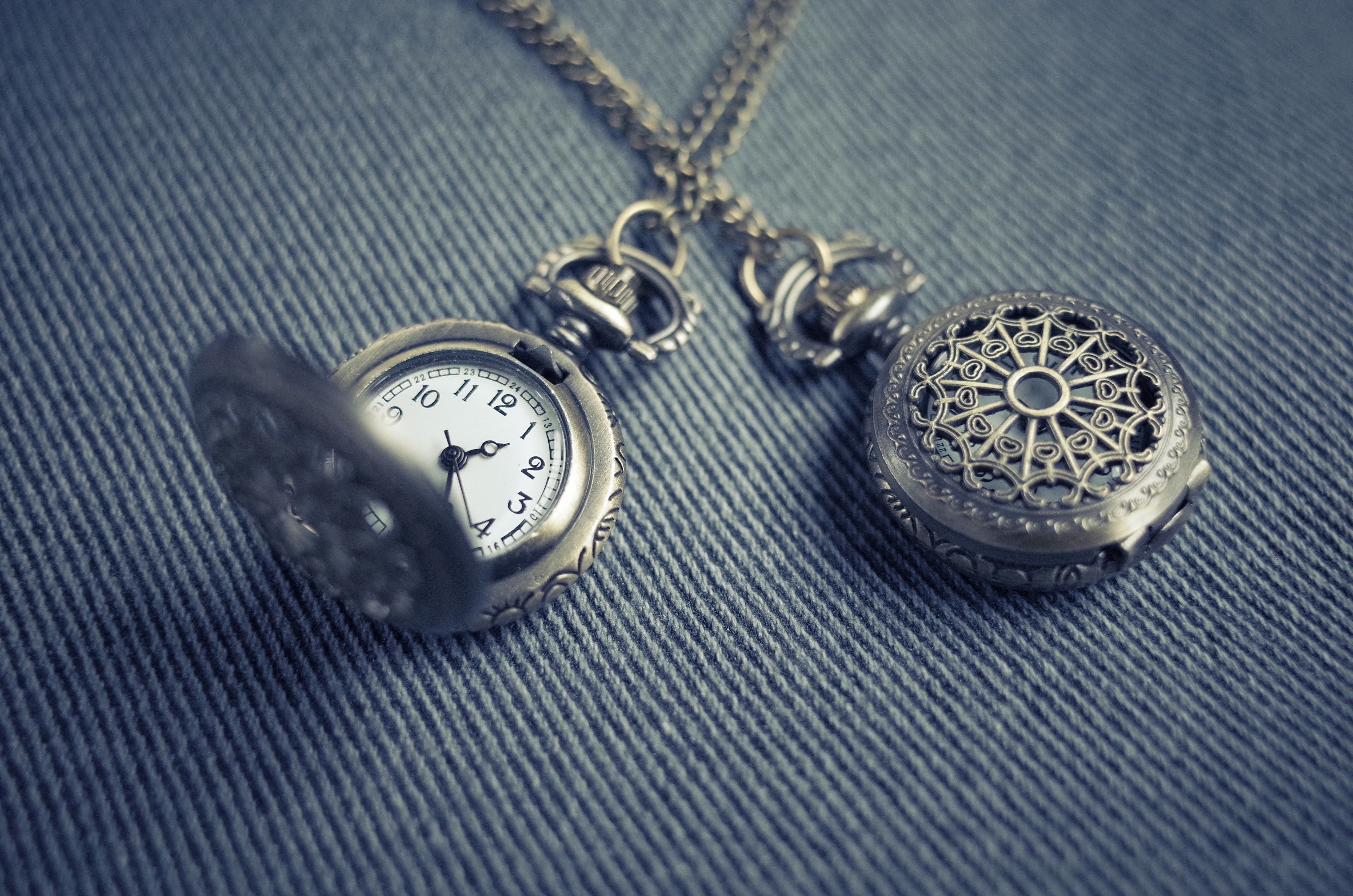 Two pocket watches on a chain HD Wallpaper
