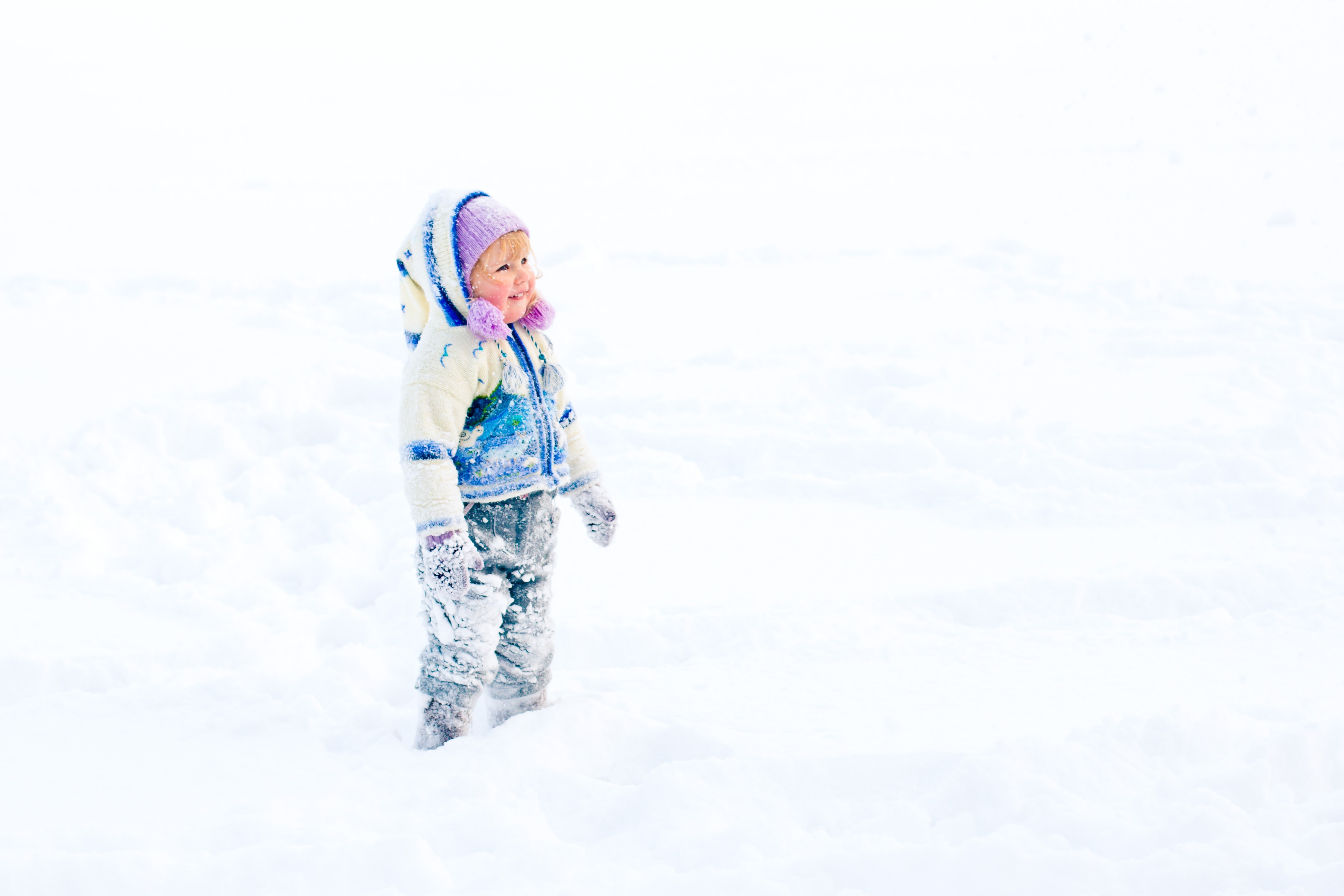 Little girl in snow HD Wallpaper