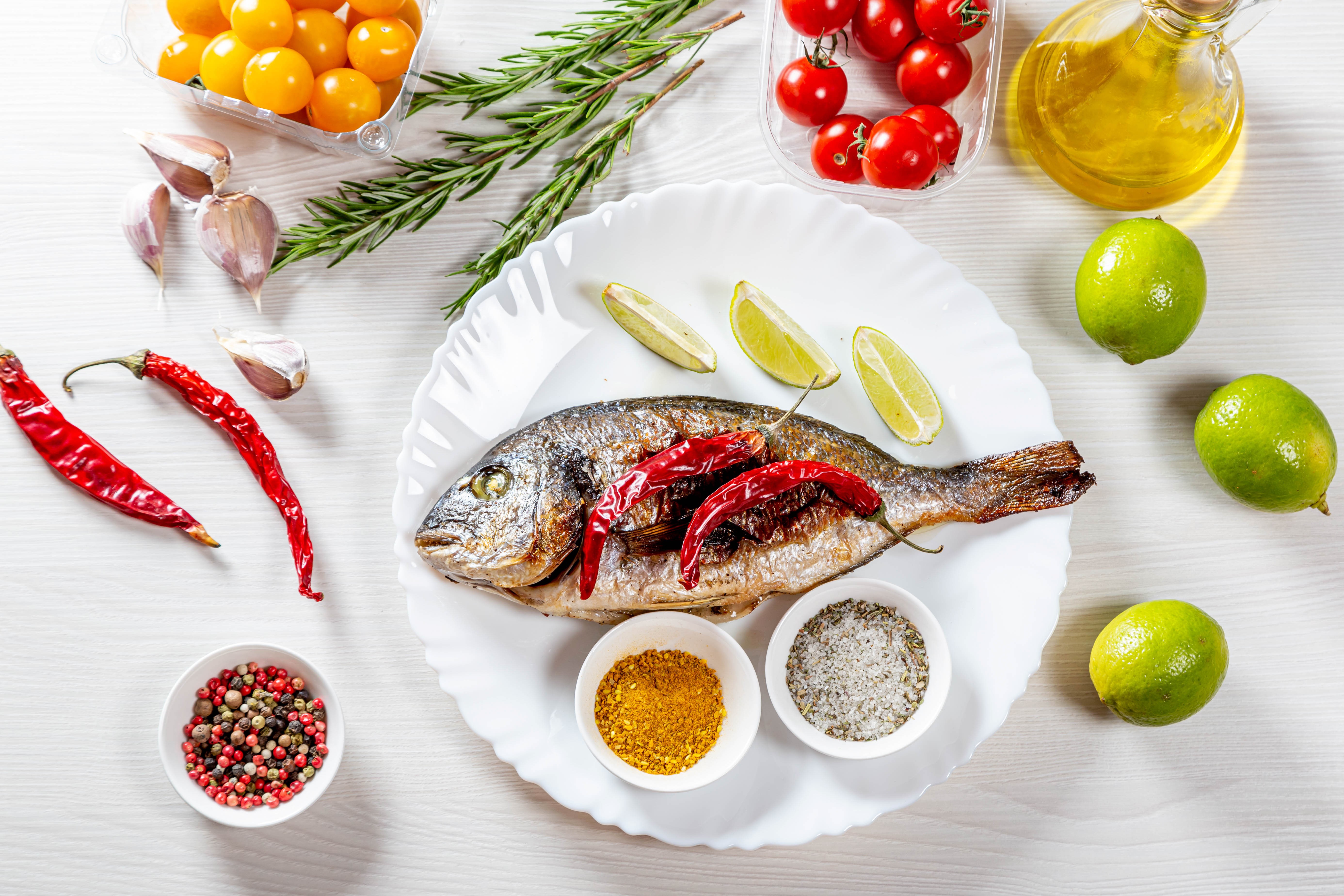 Whole Roasted Fish with Chili Peppers, Limes, and Spices HD Wallpaper