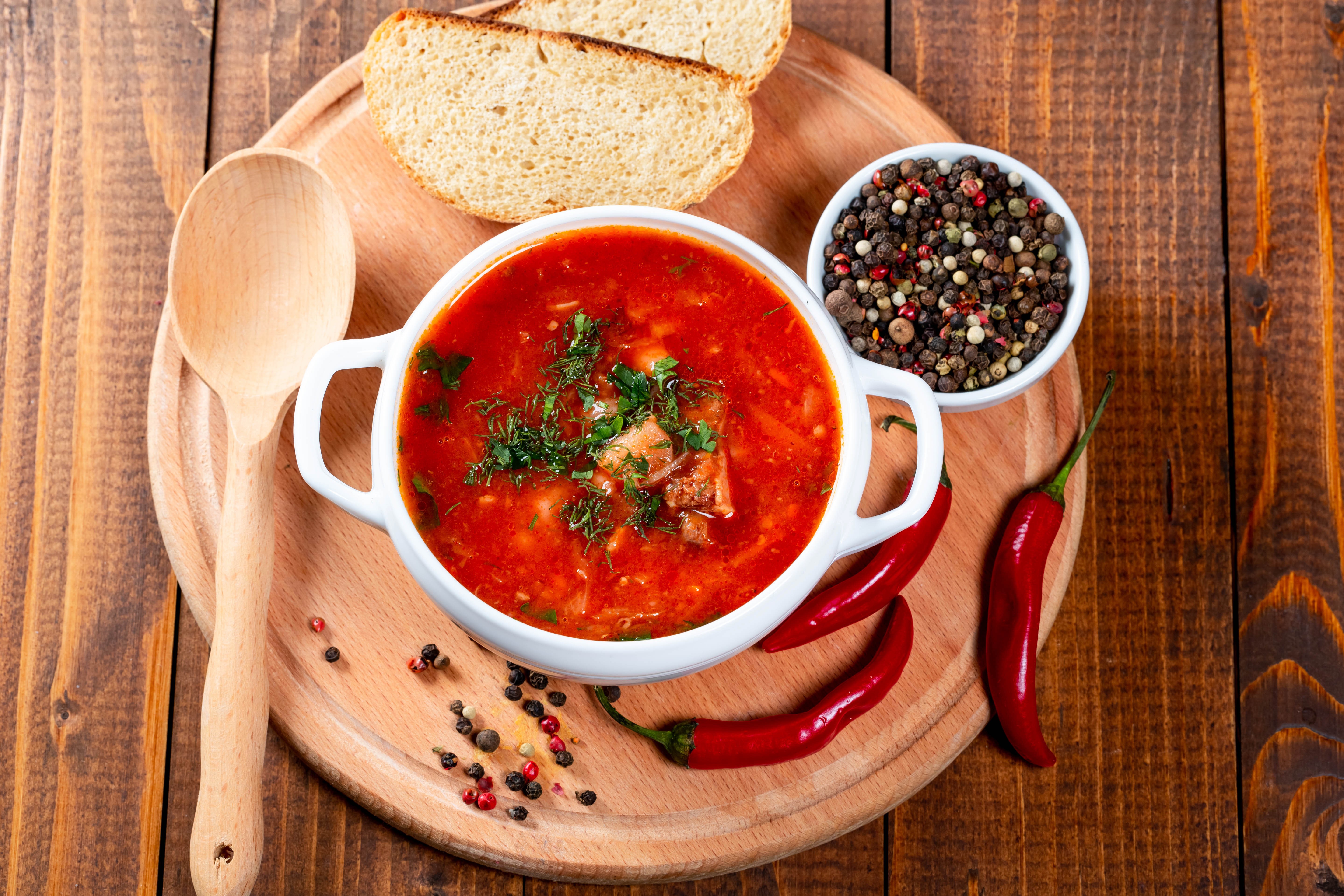 Borscht soup with bread, chili peppers, and peppercorns HD Wallpaper