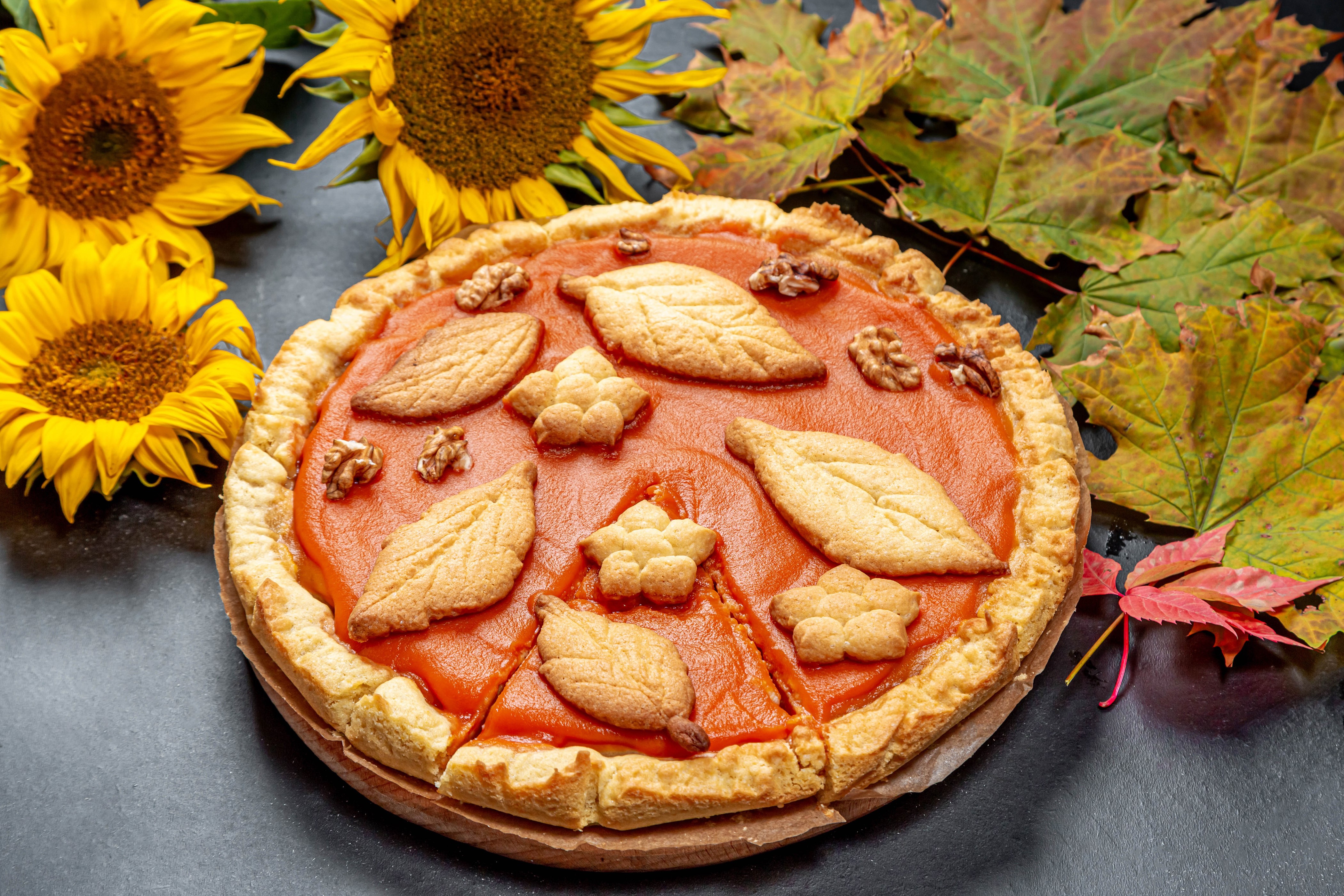Autumn pie with sunflowers and maple leaves HD Wallpaper