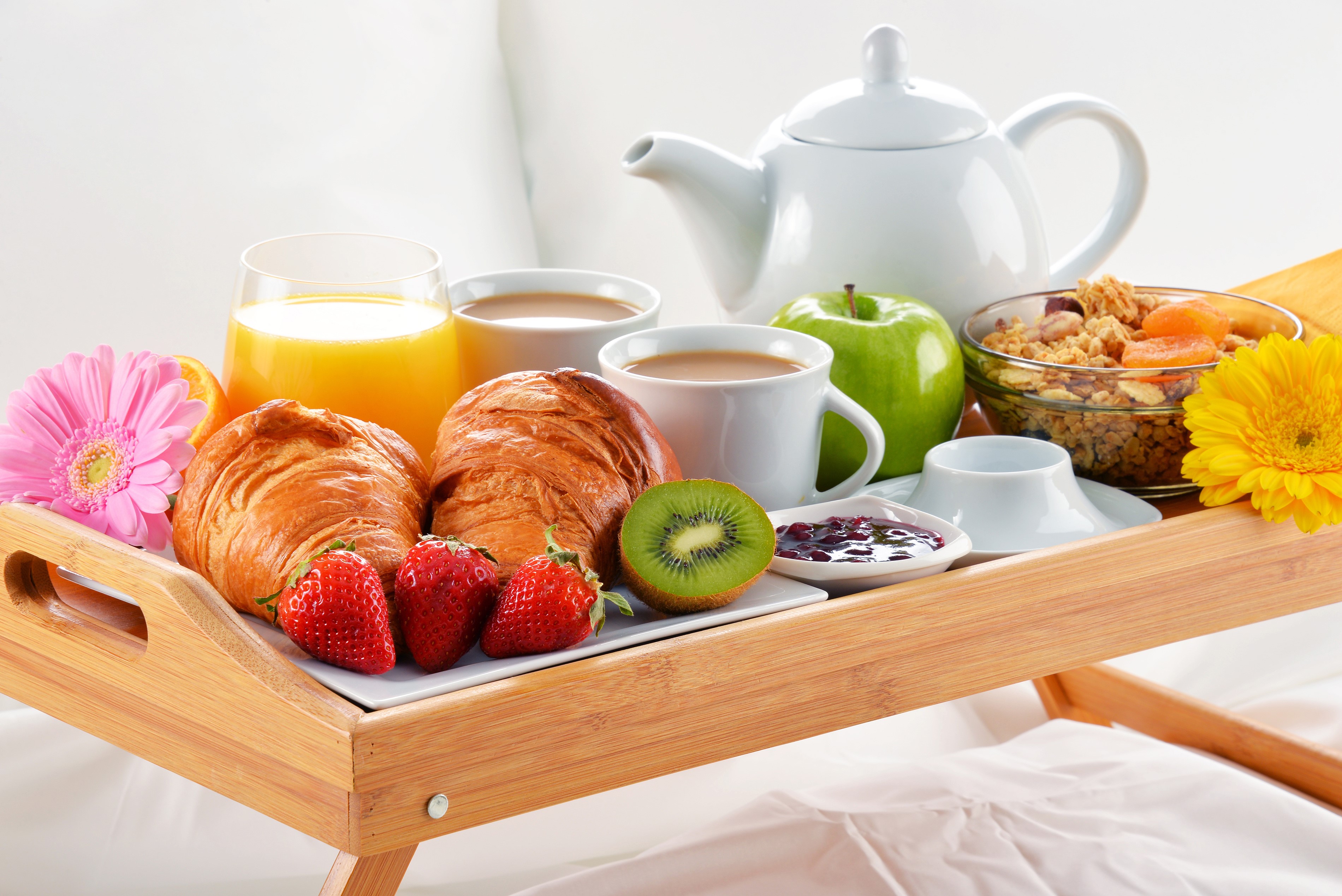 Breakfast tray with croissants, fruit, coffee, and juice HD Wallpaper