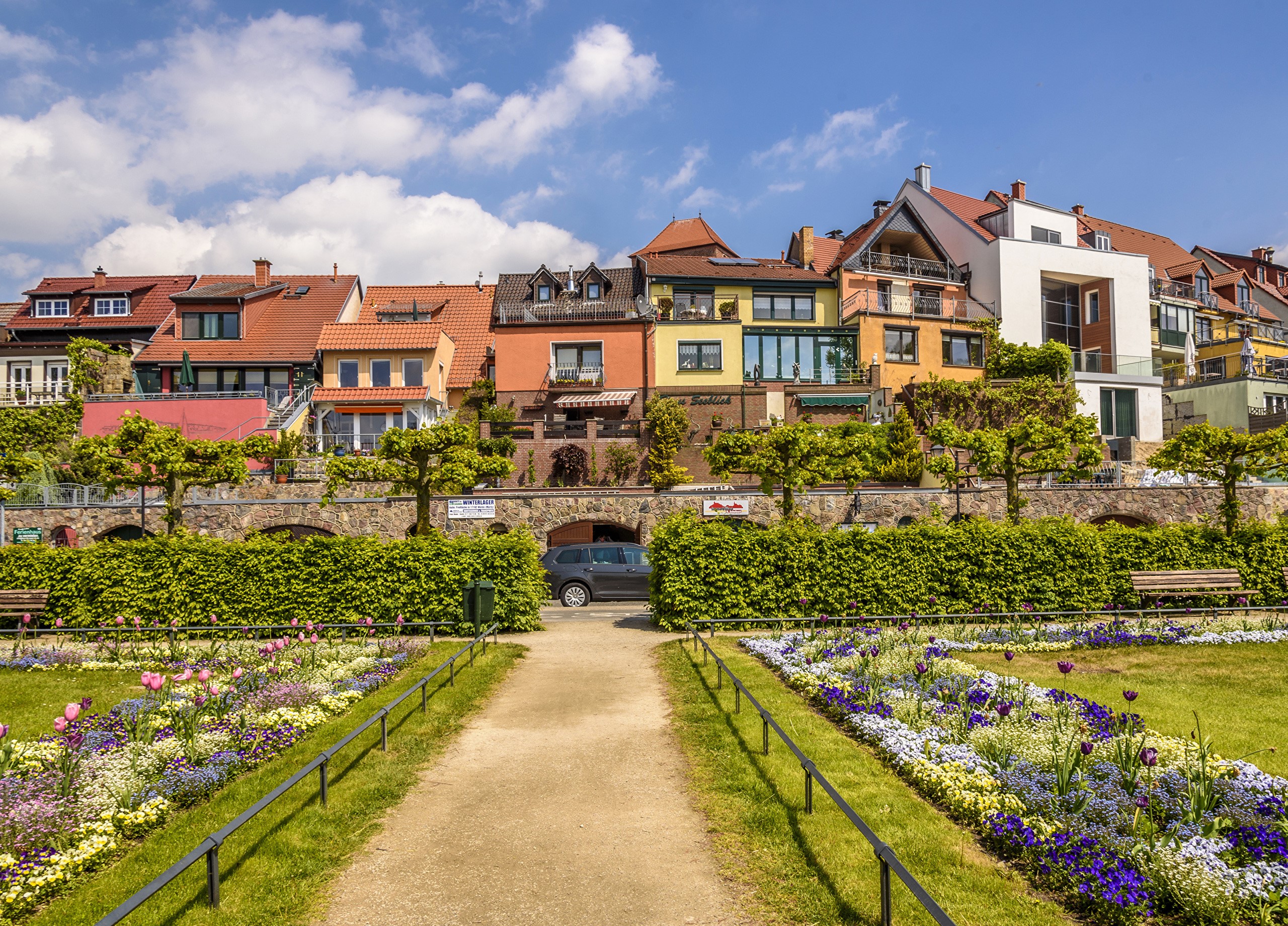 Colorful houses on a hill in Waren, Germany HD Wallpaper