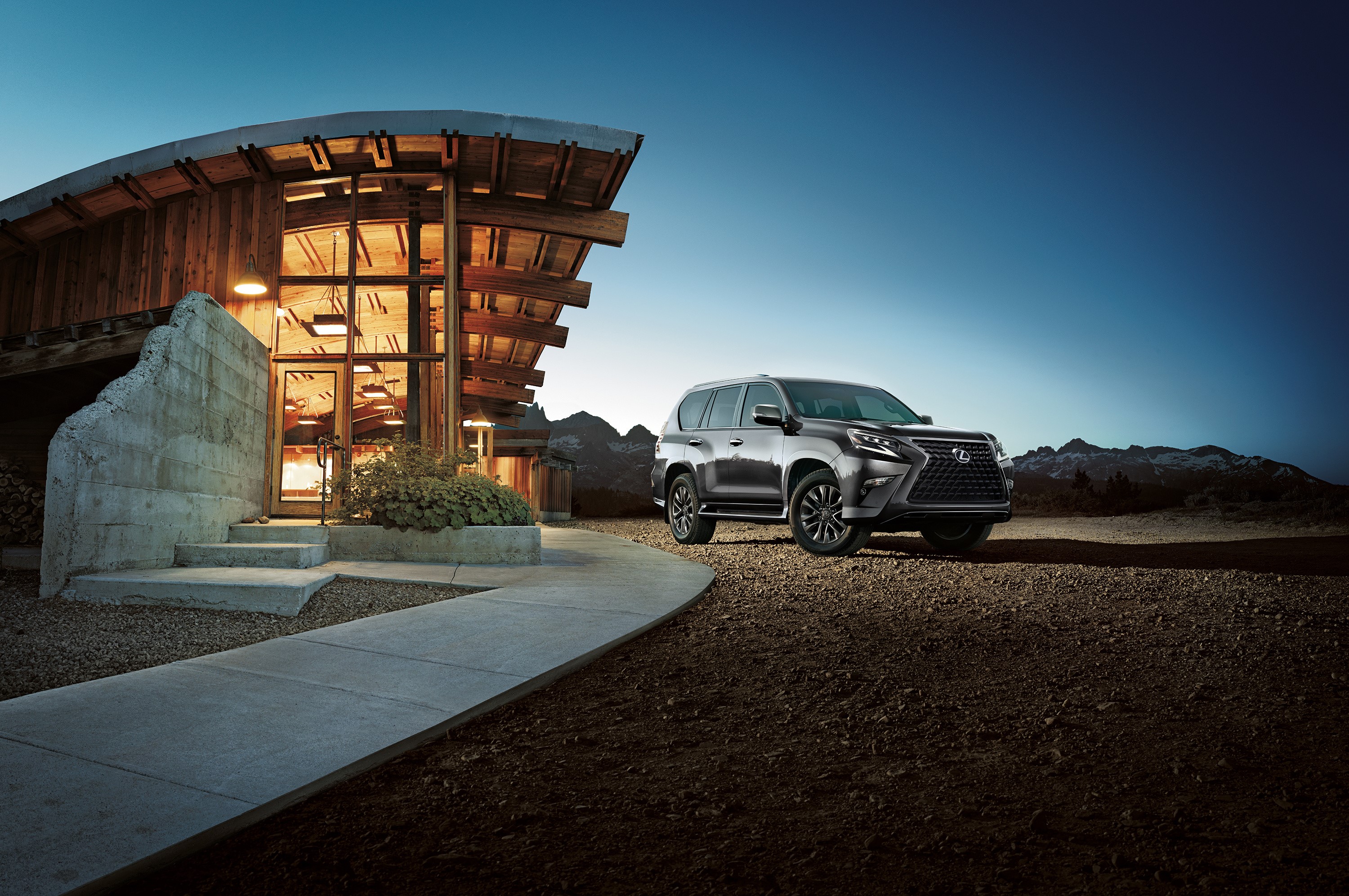 Grey Lexus GX 460 SUV parked near a modern building HD Wallpaper