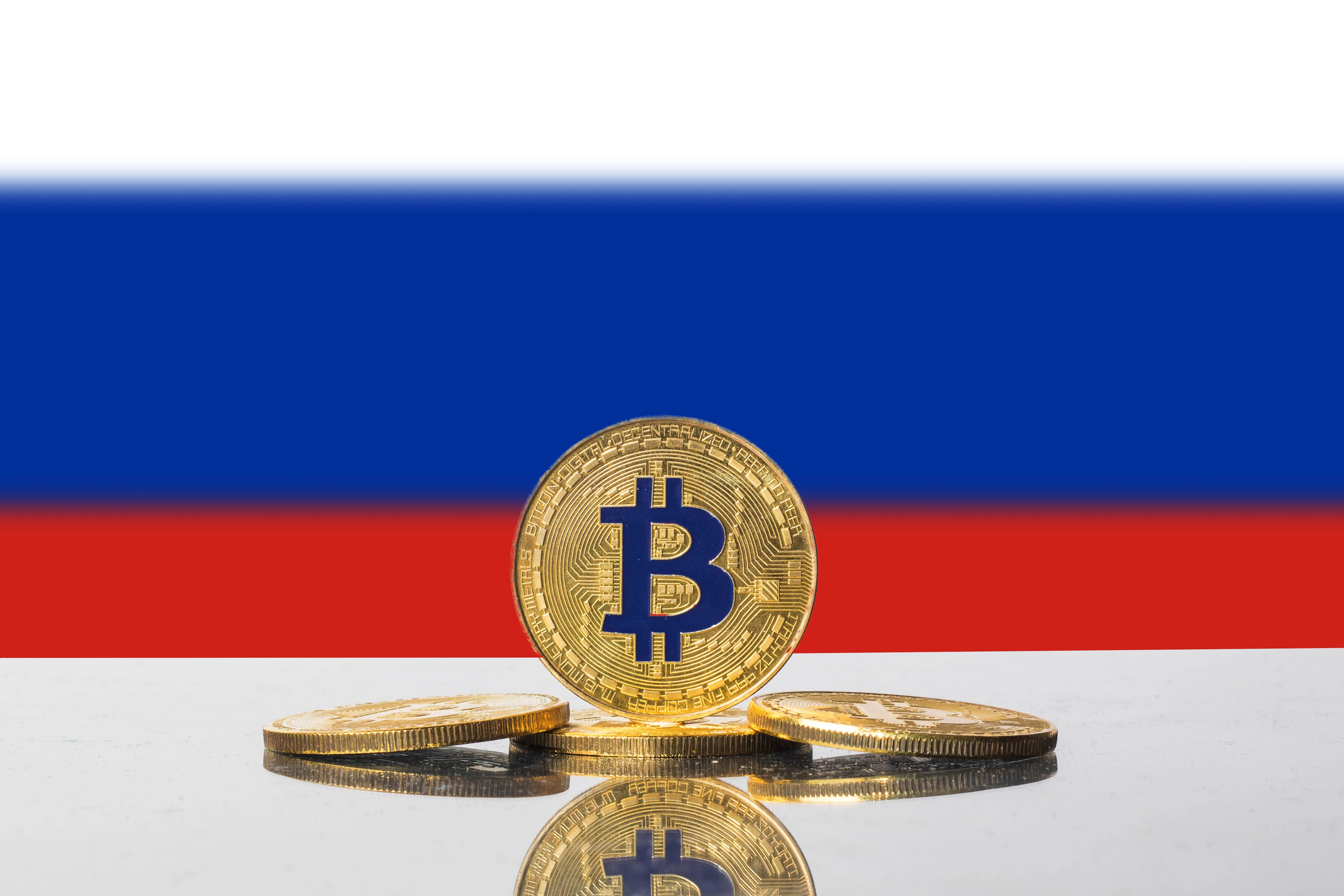 Bitcoin coins on Russian flag background HD Wallpaper