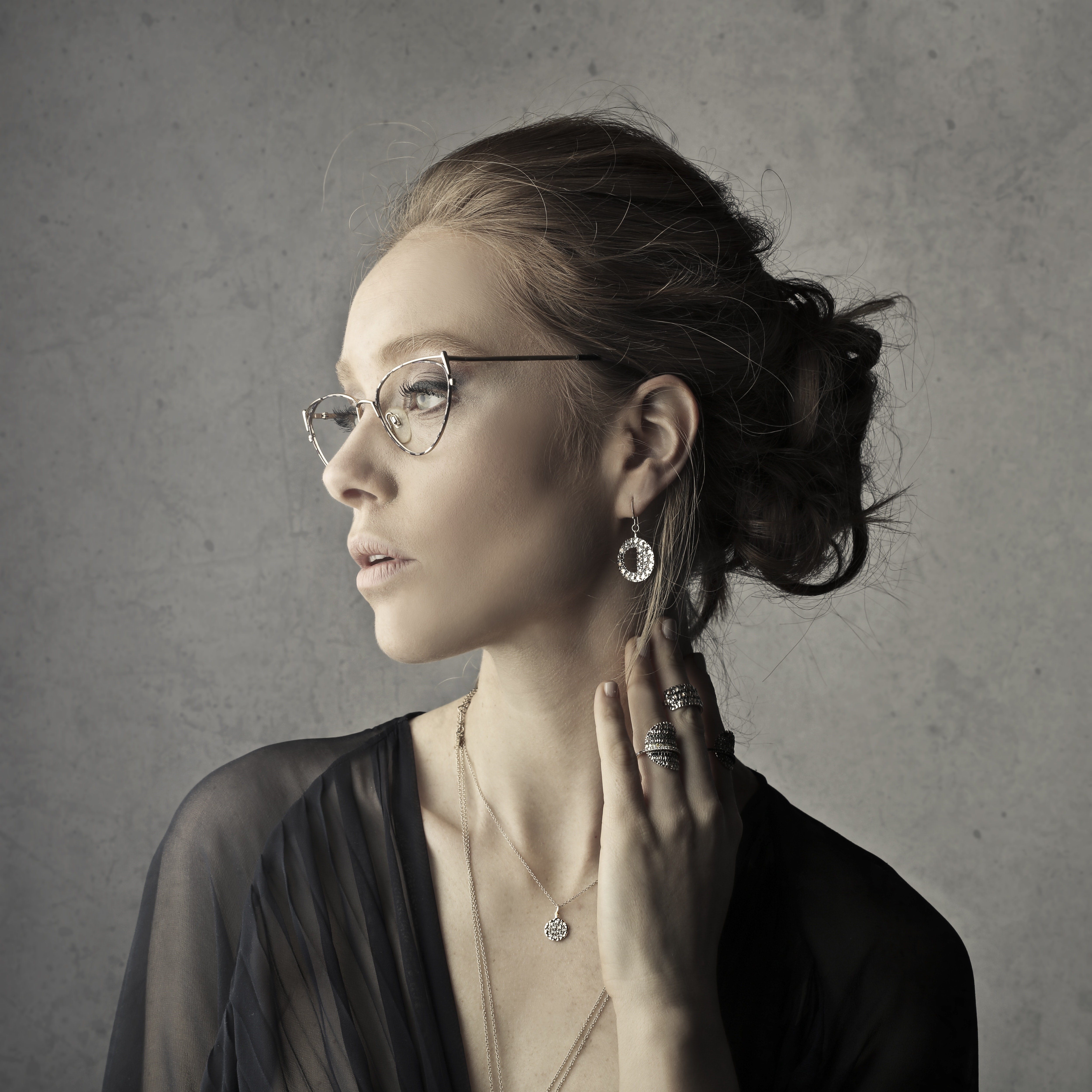 Woman with Glasses and Jewelry HD Wallpaper