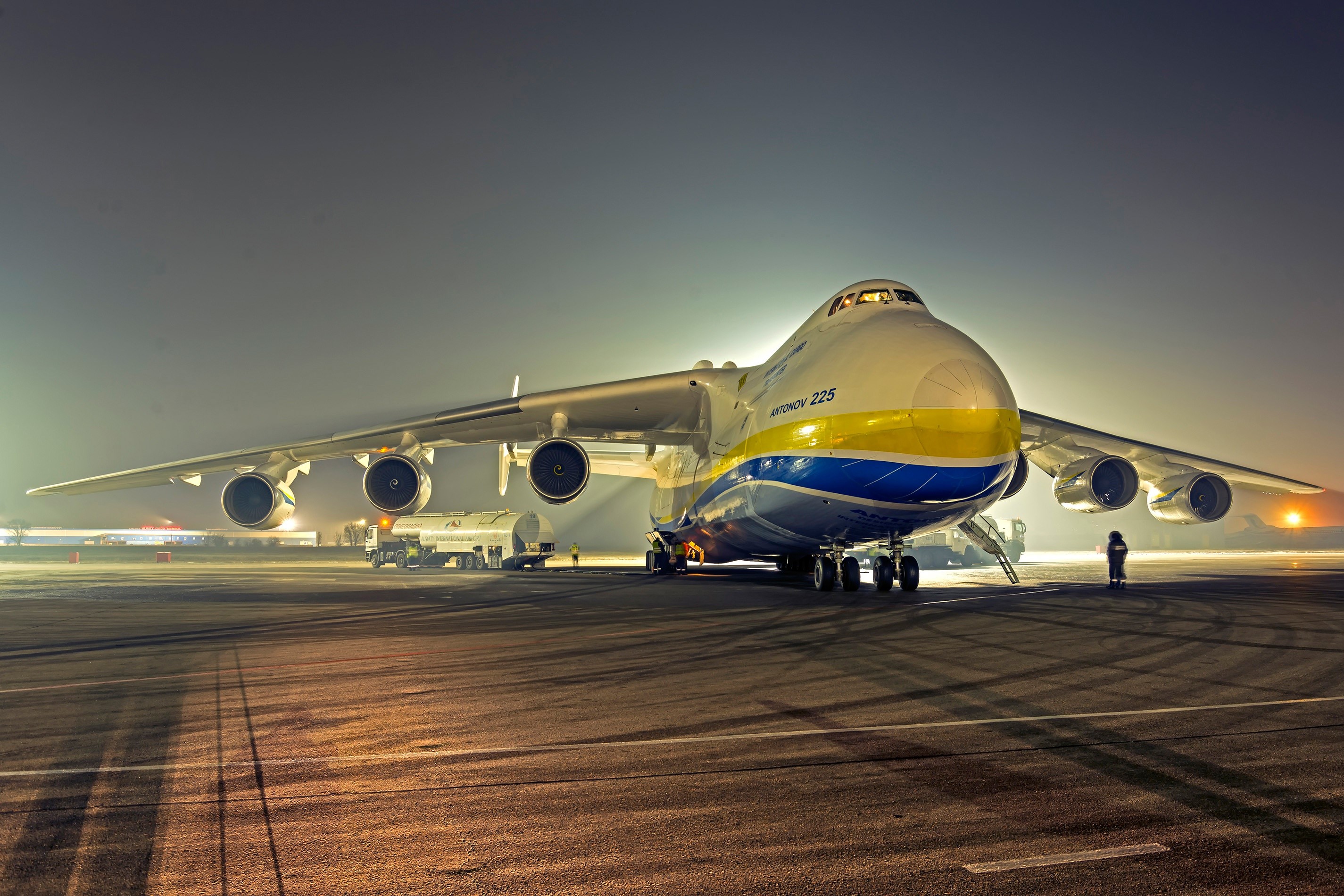 Antonov An-225 Mriya transport aircraft on tarmac at night HD Wallpaper