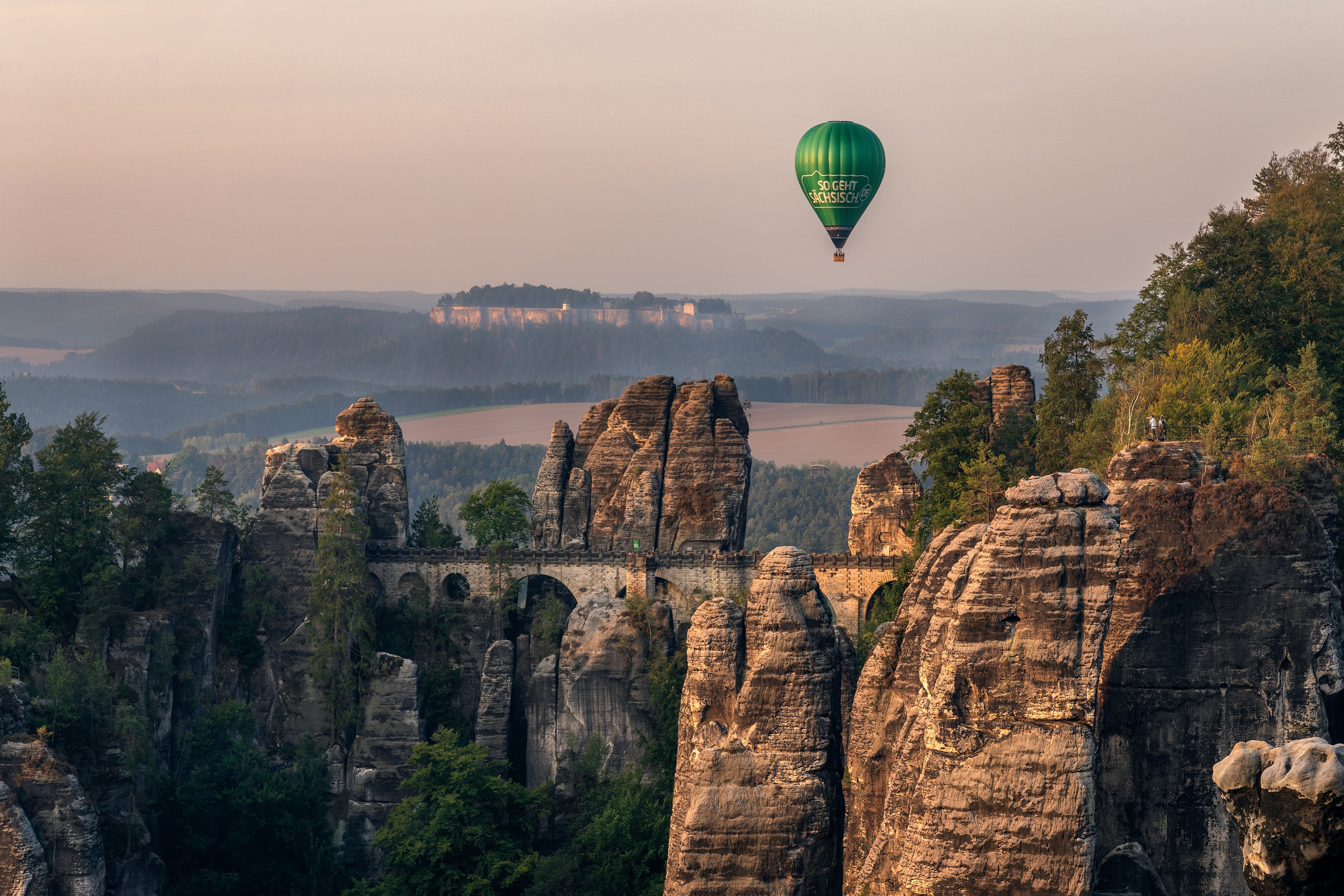 Hot air balloon over Bastei Bridge, Germany HD Wallpaper