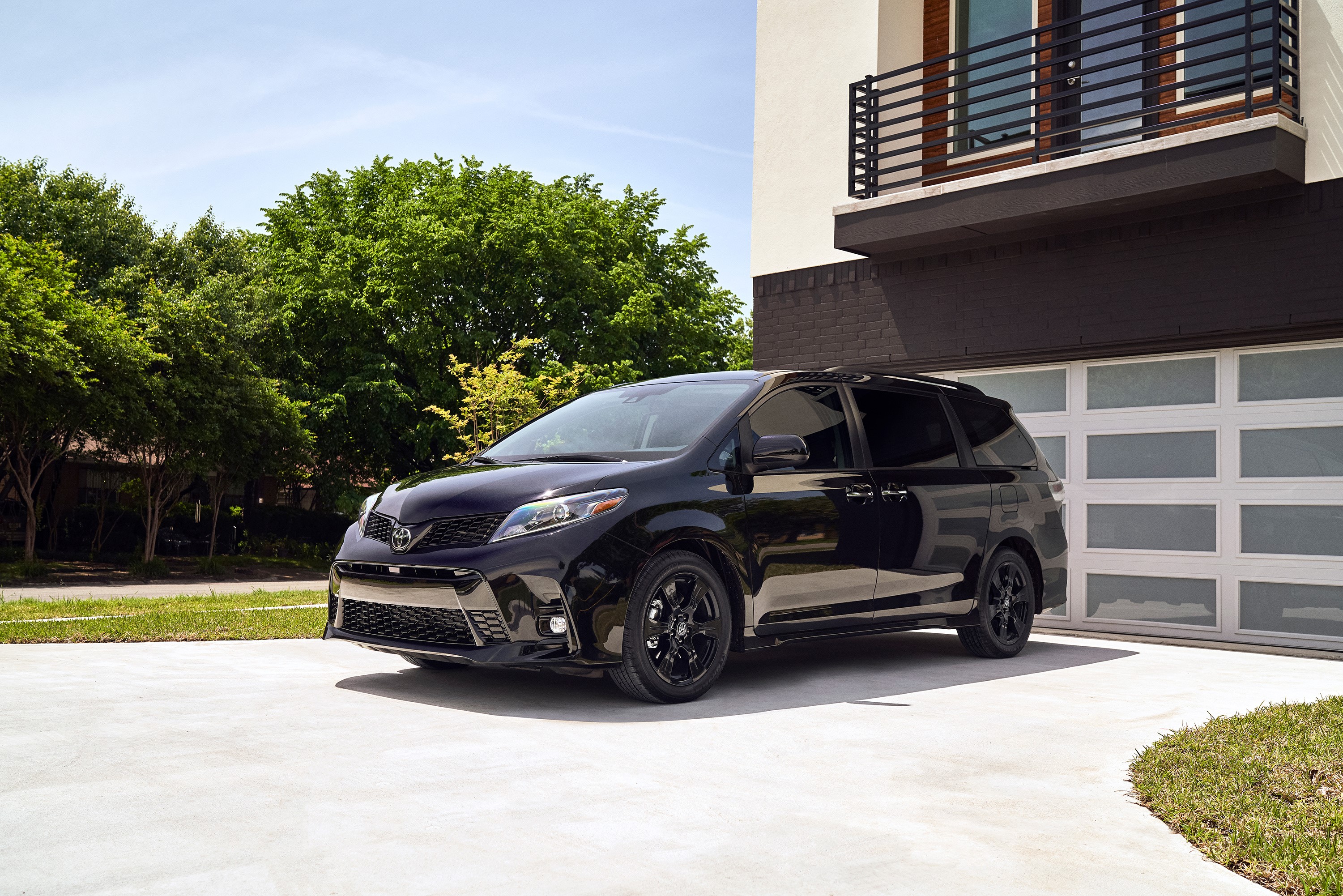 Black Toyota Sienna Nightshade parked in driveway HD Wallpaper