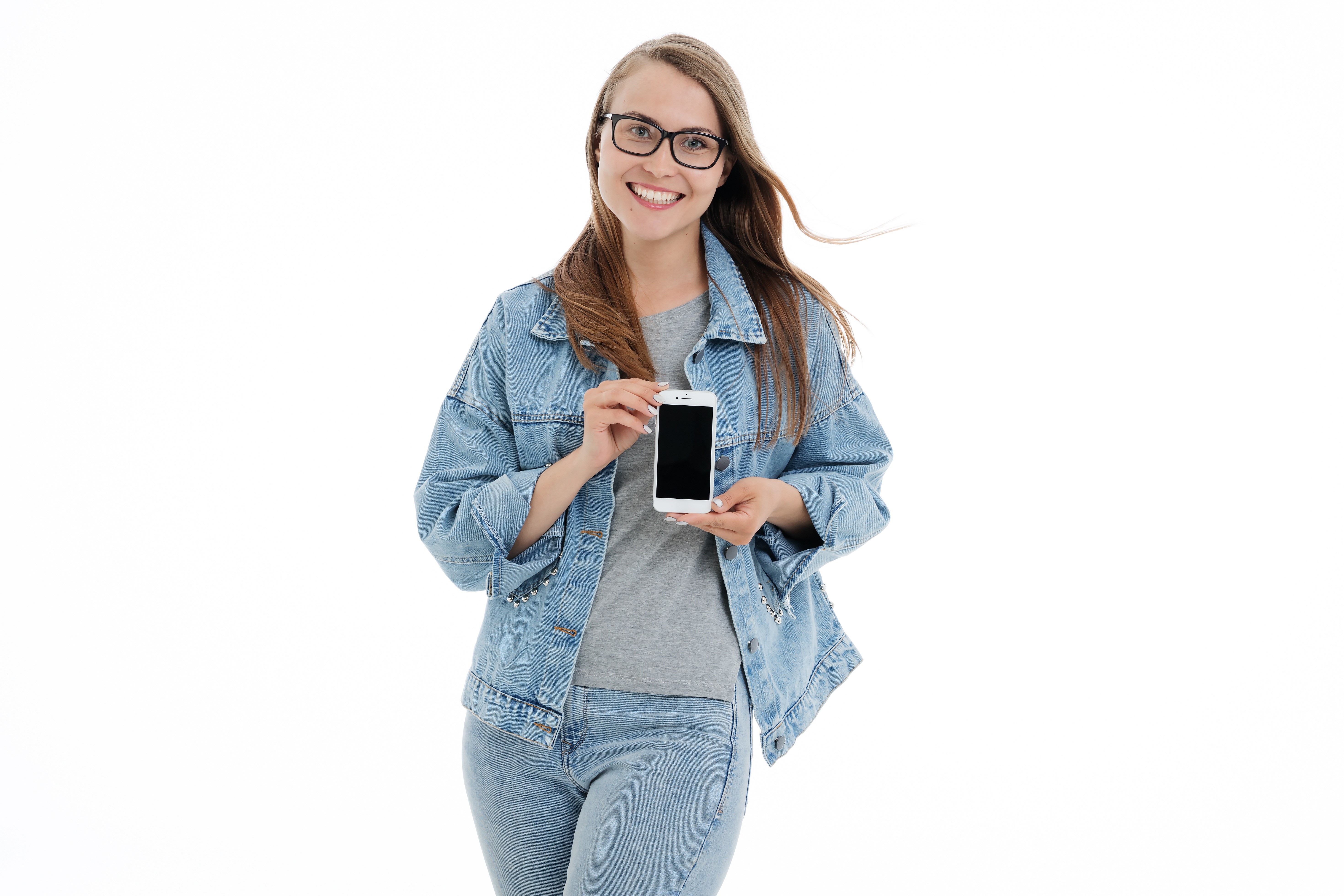 Woman in Denim Jacket Holding Smartphone HD Wallpaper