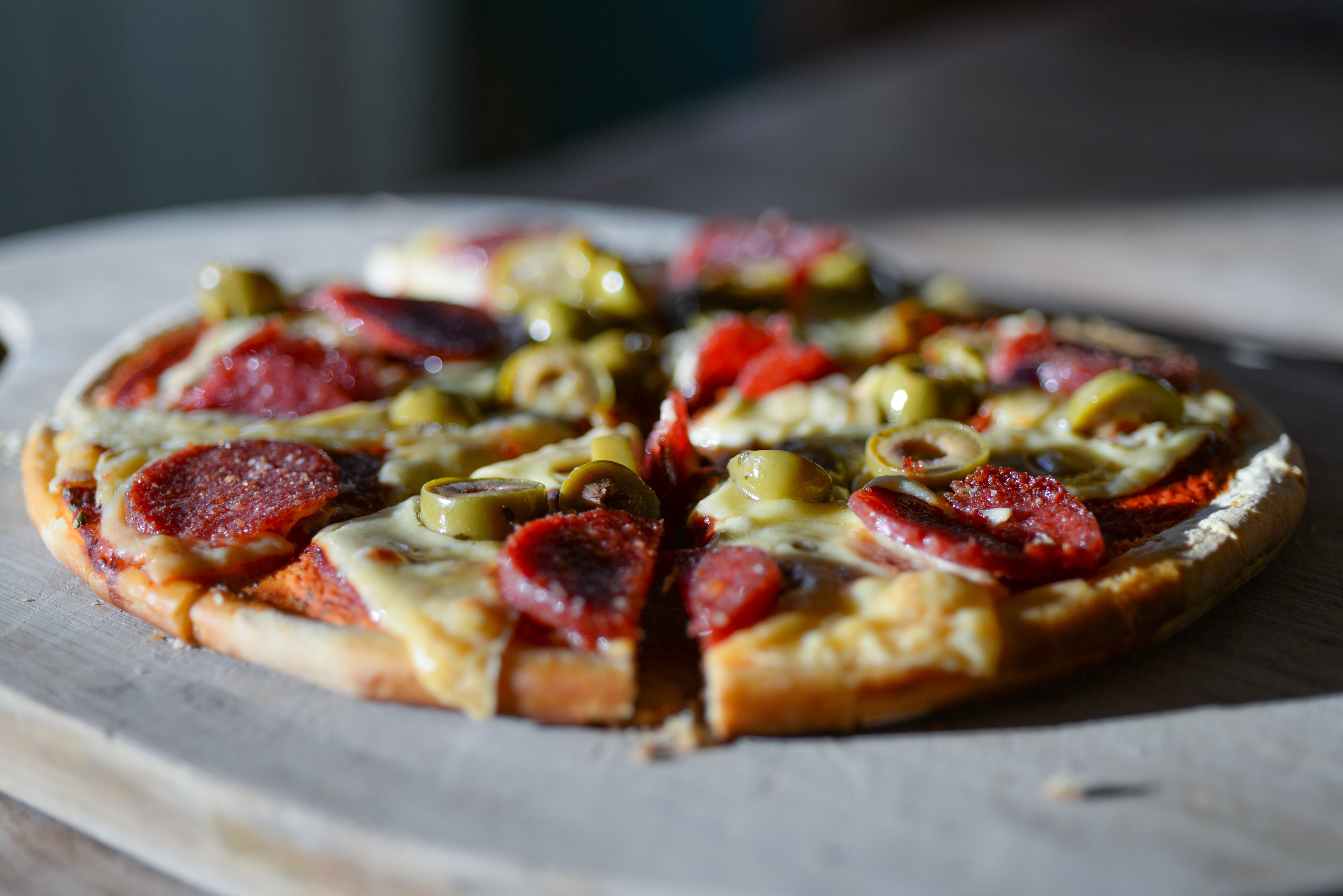 Pizza with Sausage and Olives HD Wallpaper