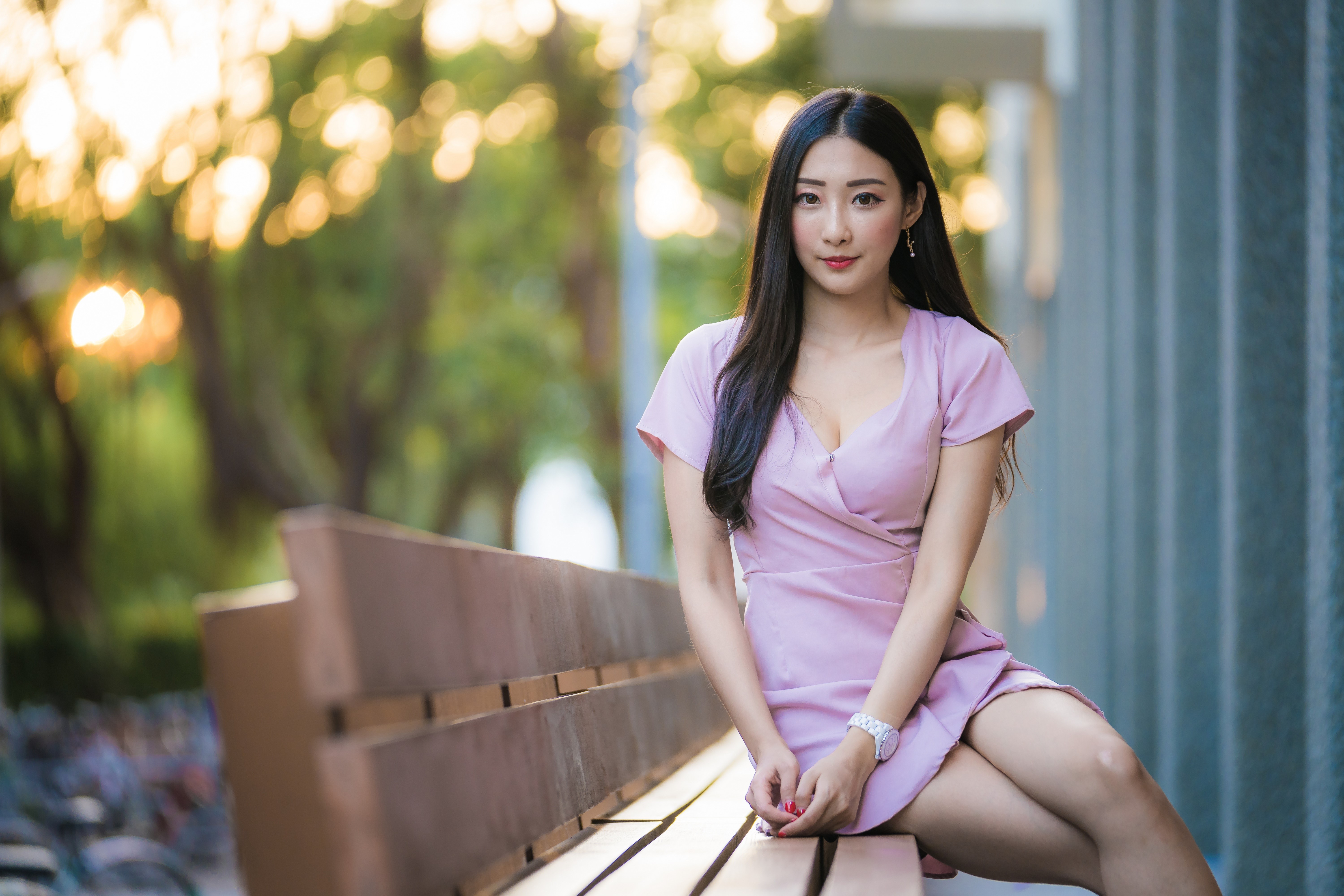Brunette Asian Woman Sitting on Bench in Pink Dress 4K HD Wallpaper