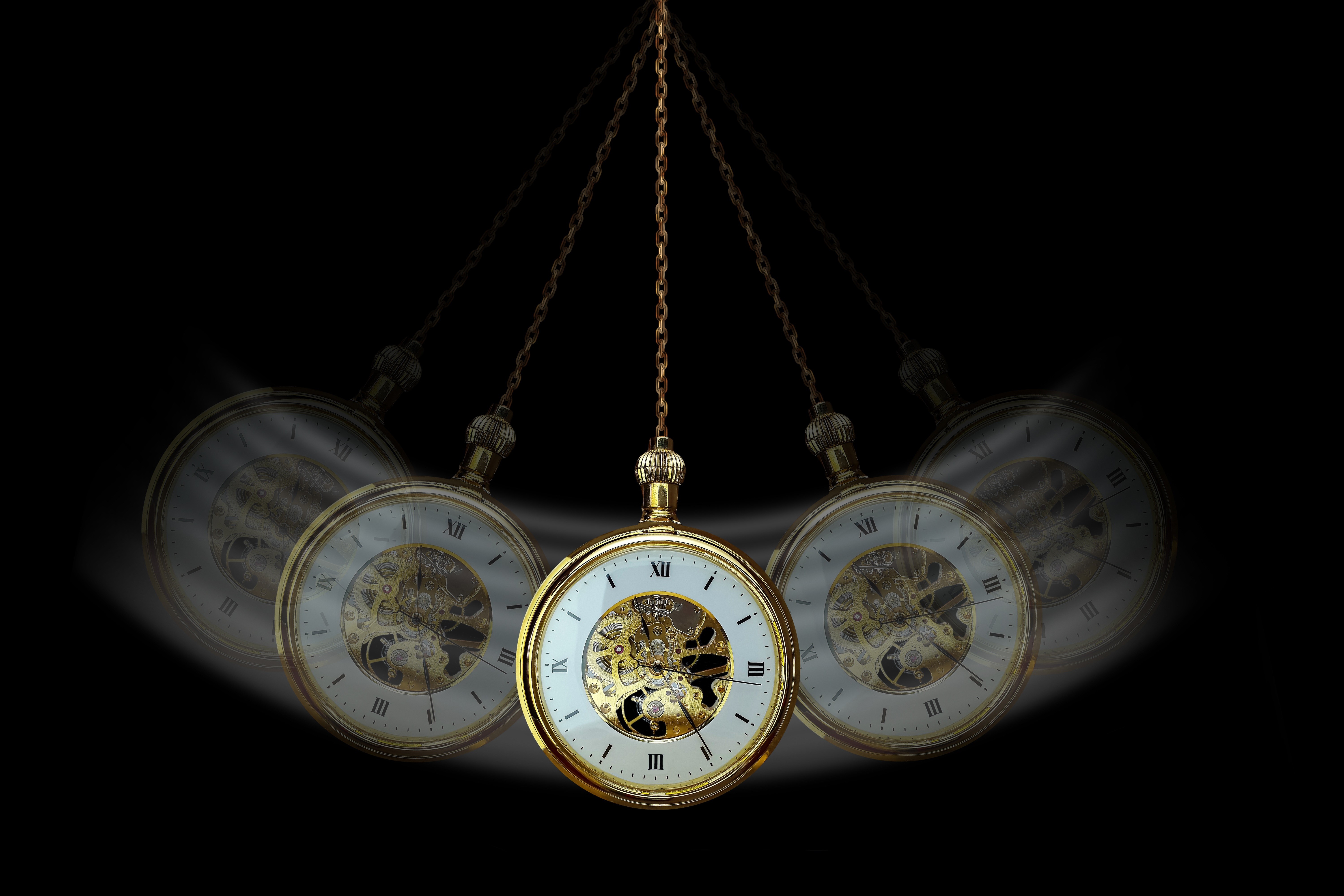 Hypnosis pocket watch swinging on a chain HD Wallpaper