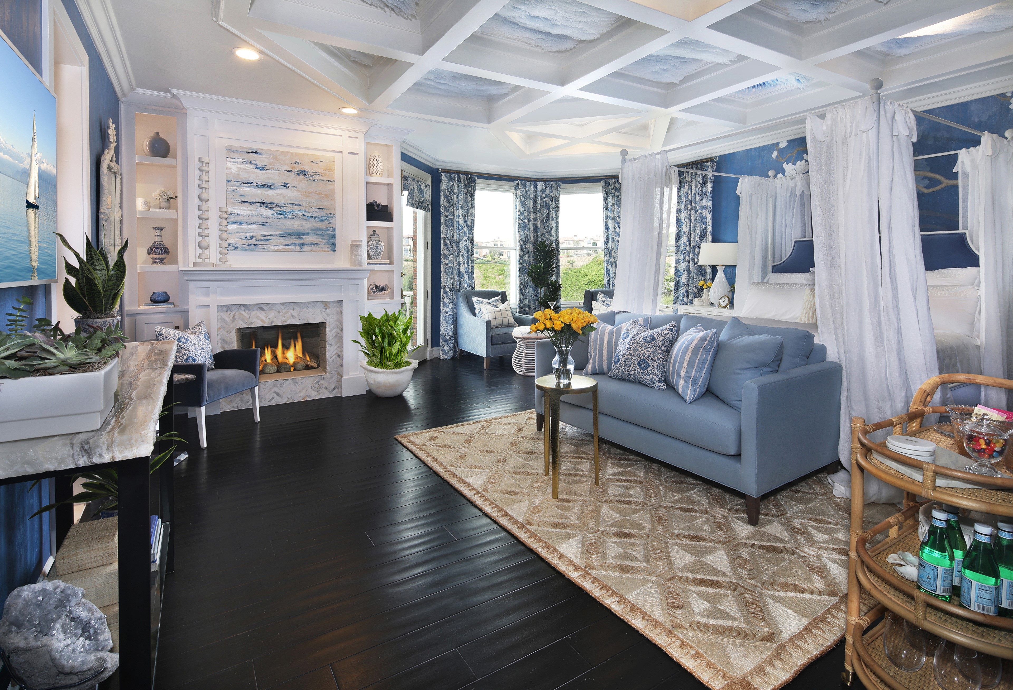 Living room with sofa, carpet, and fireplace HD Wallpaper