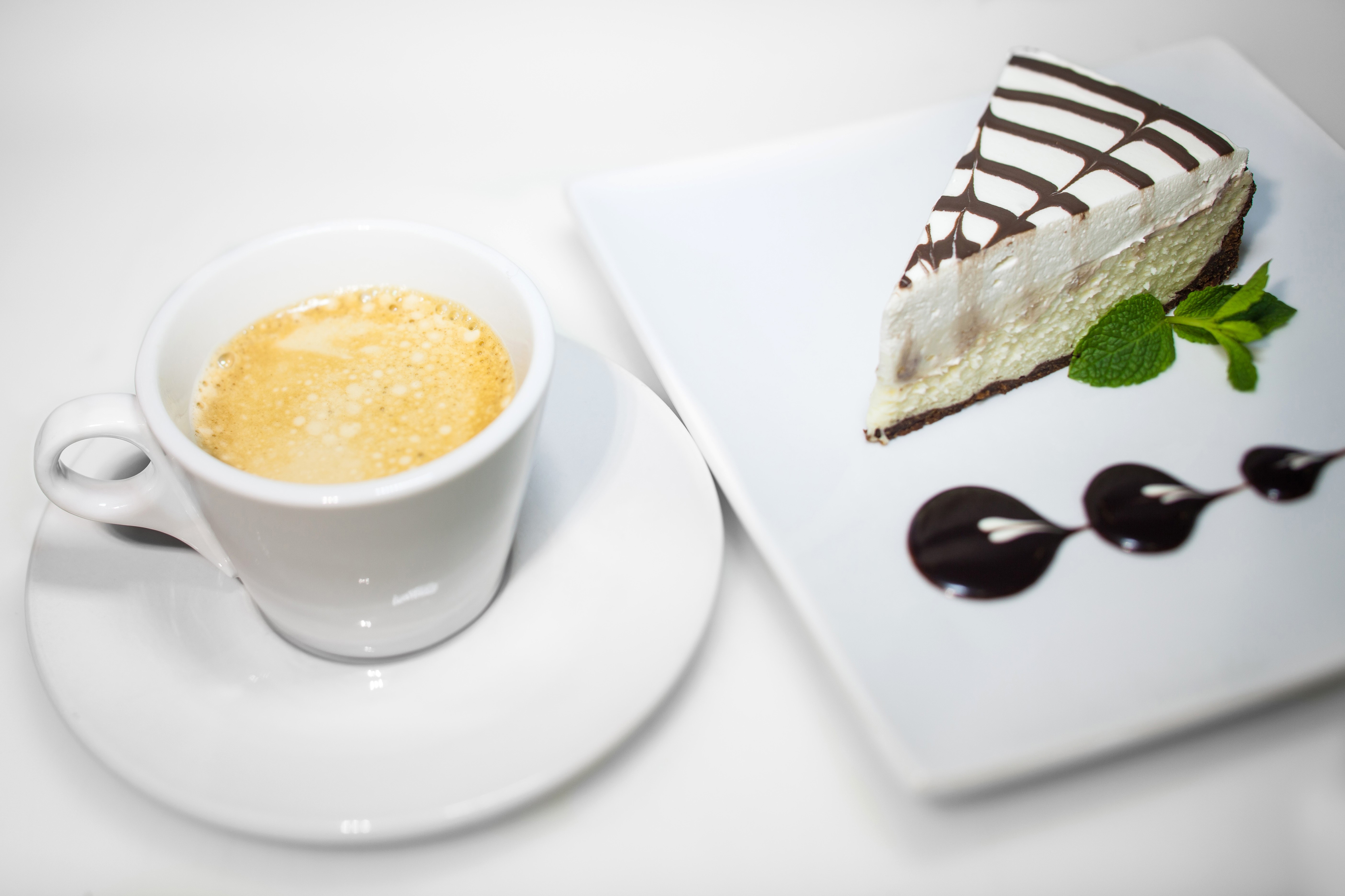 Espresso cup and slice of chocolate cake HD Wallpaper