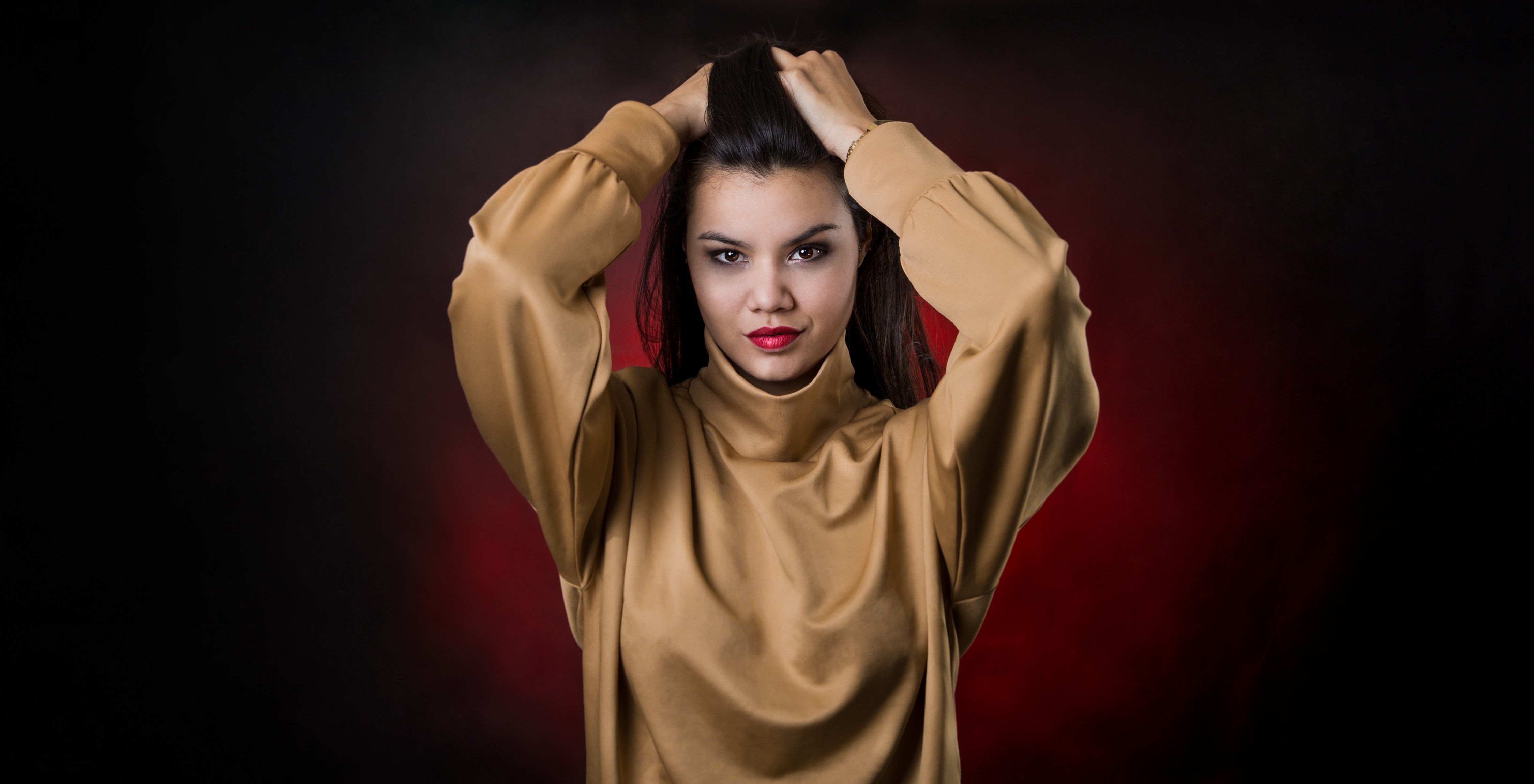 Woman with hands in hair HD Wallpaper