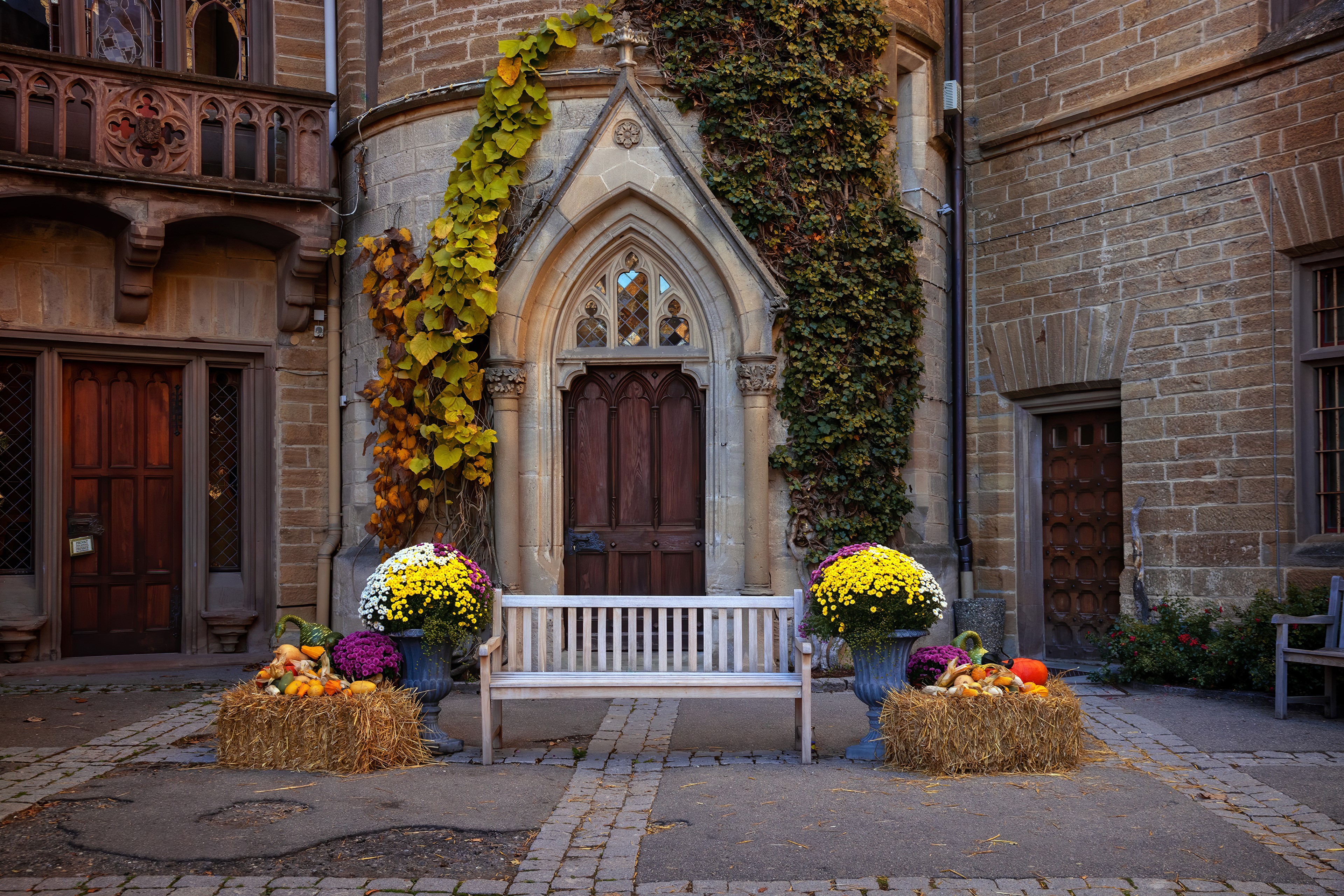Hohenzollern Castle courtyard with autumn decorations HD Wallpaper
