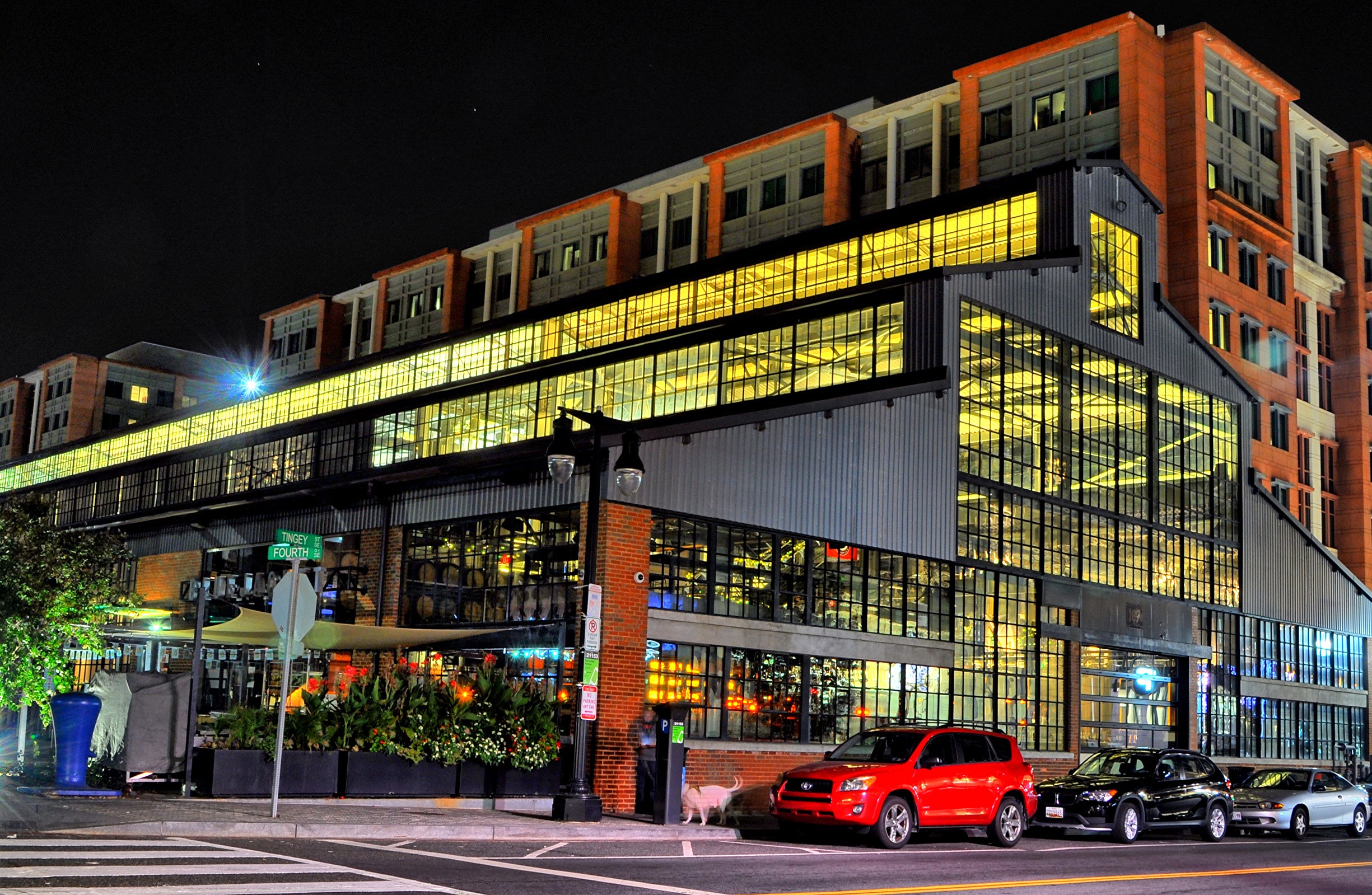 Modern building with large windows at night HD Wallpaper