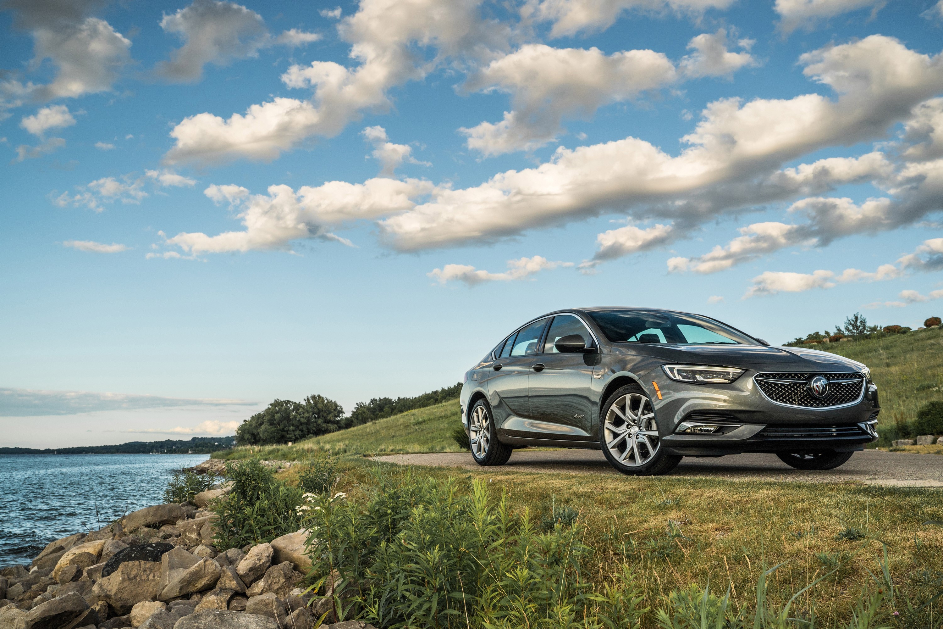 2019 Buick Regal Avenir Sedan on a Lakeside Road HD Wallpaper