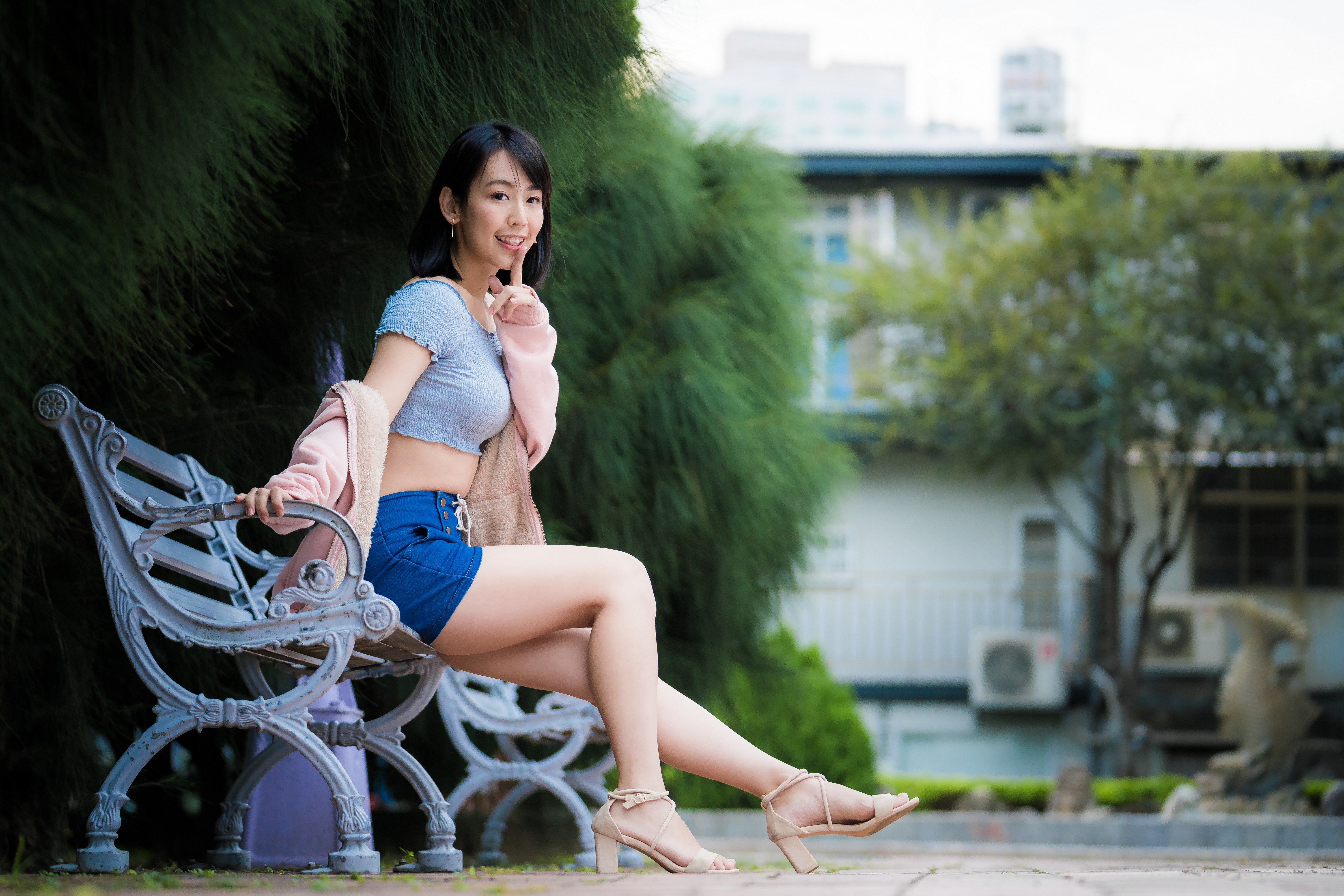 Asian Brunette Girl Sitting on Bench with Bokeh HD Wallpaper