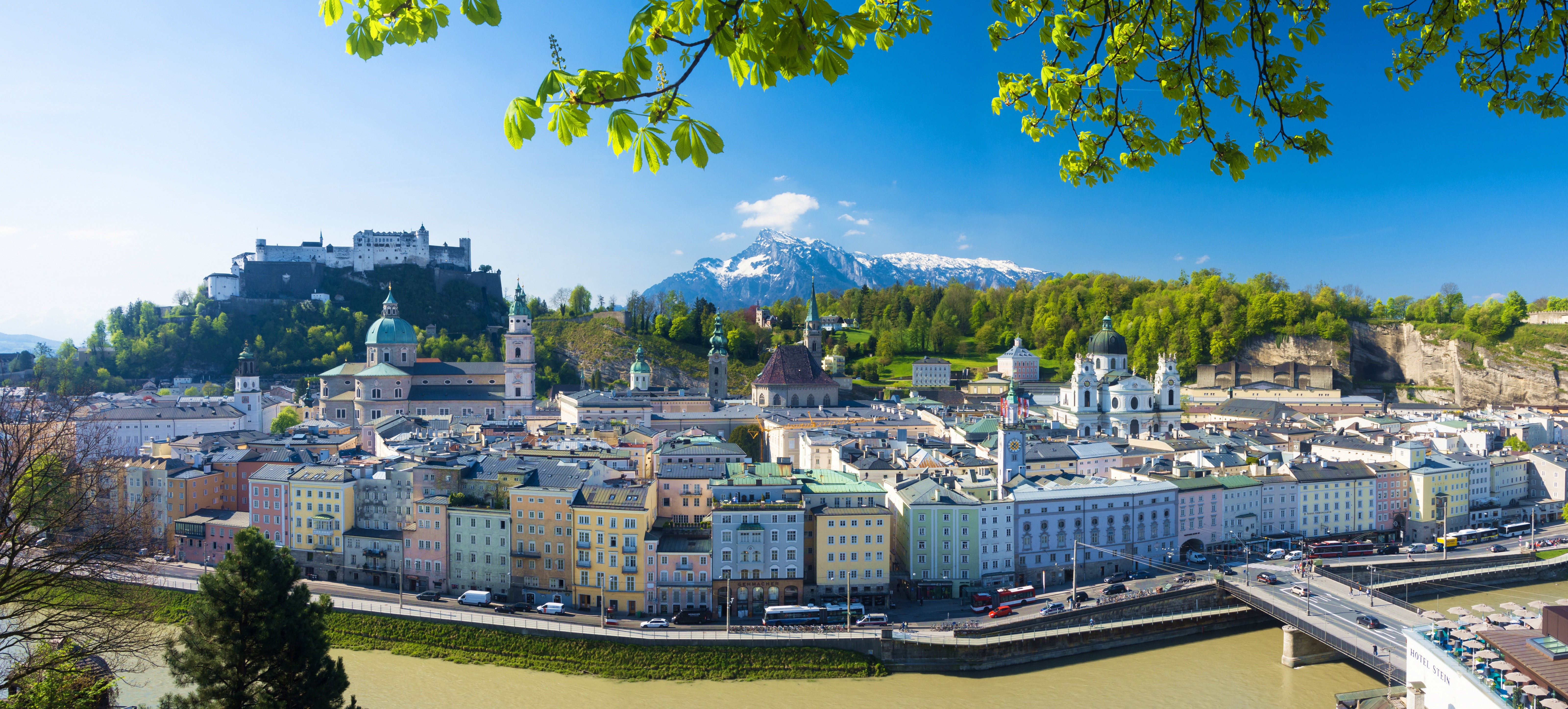 Salzburg cityscape with Festungsberg Mountain and Alps HD Wallpaper