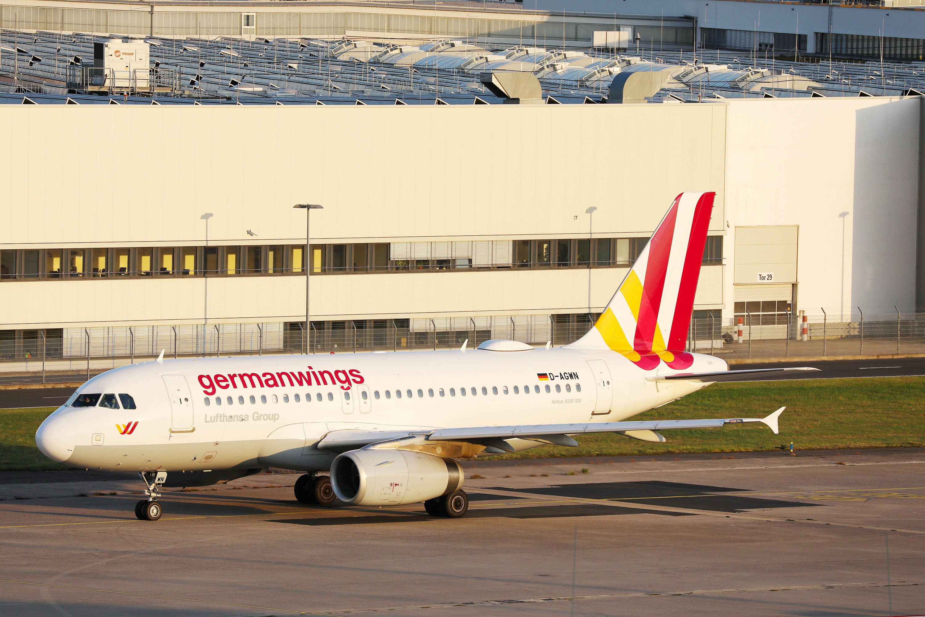 Germanwings Airbus A319 at a hangar HD Wallpaper
