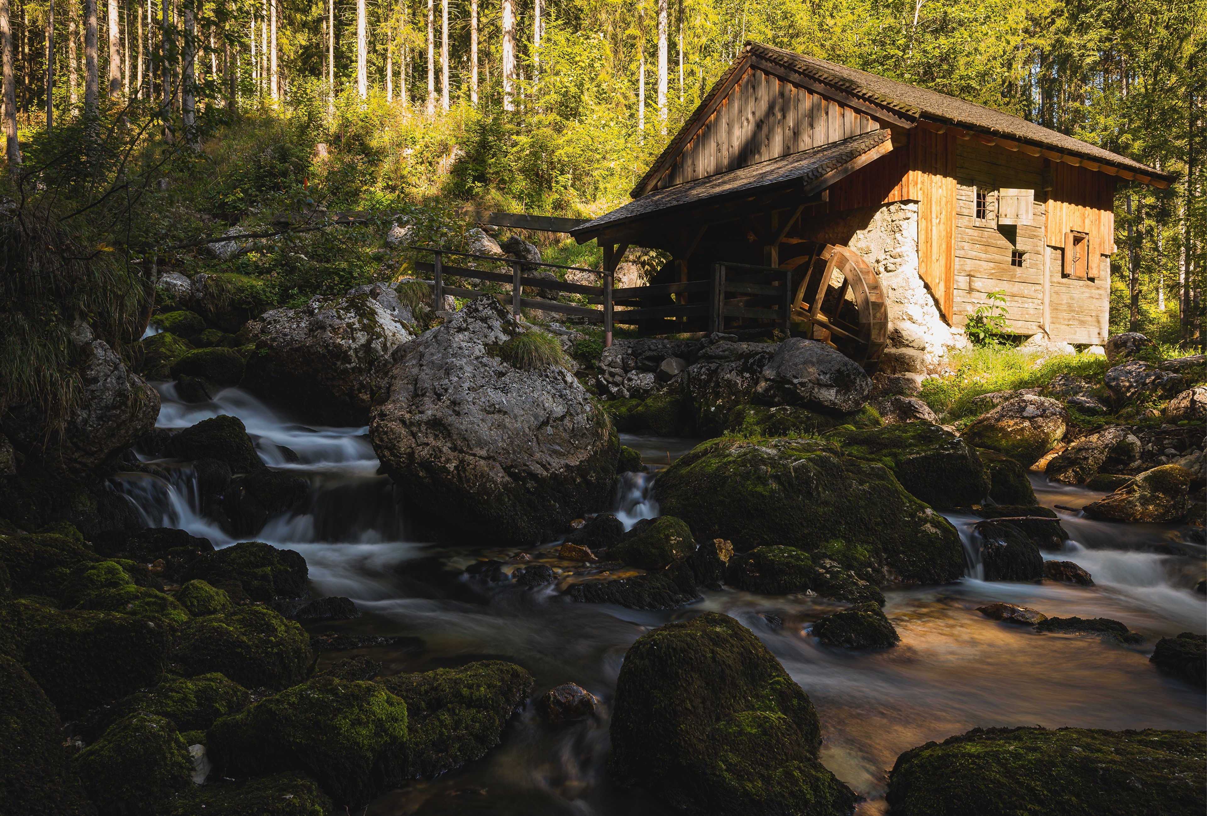 Watermill by a stream with mossy stones HD Wallpaper
