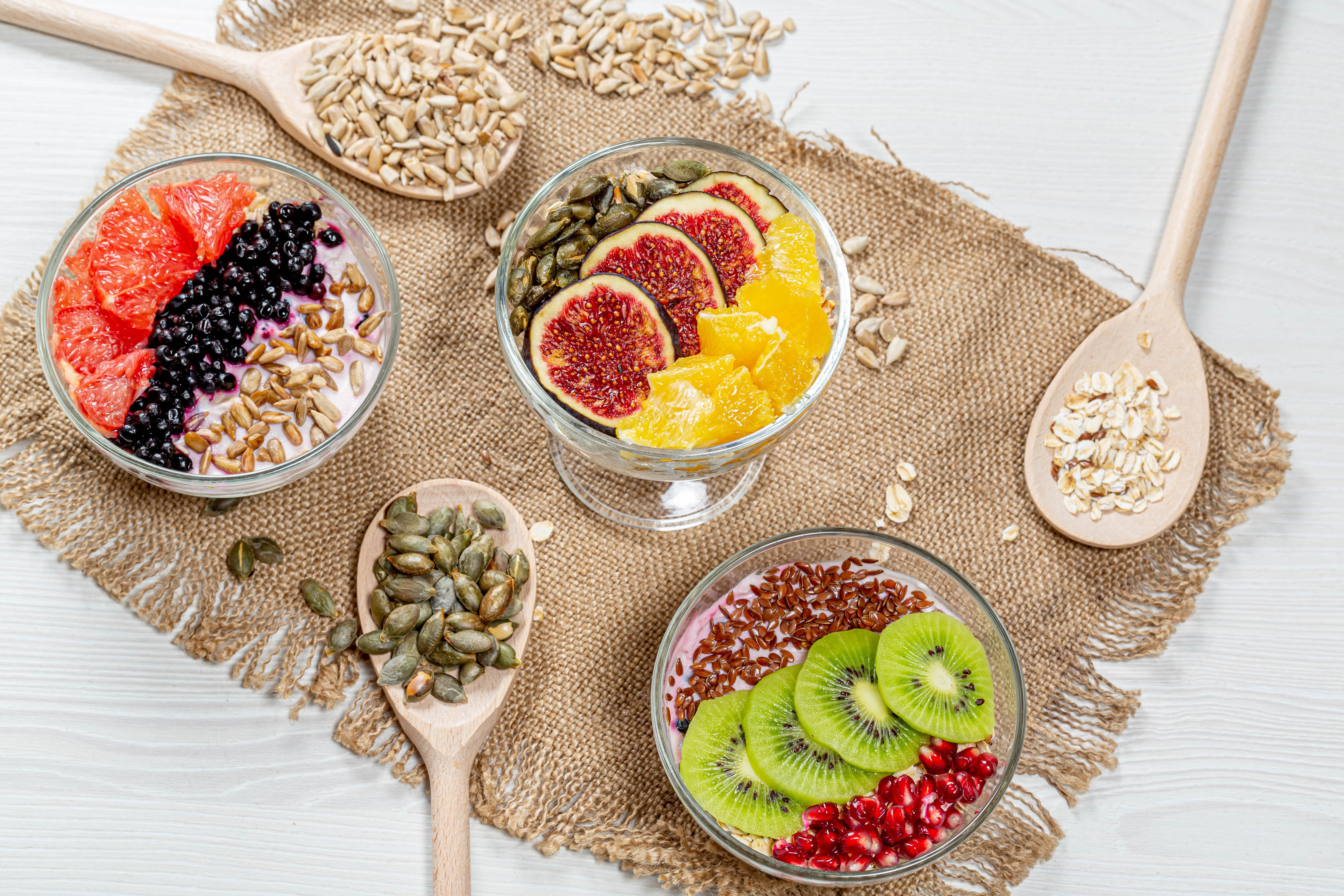 Fruit and Grain Bowls with Spoons HD Wallpaper