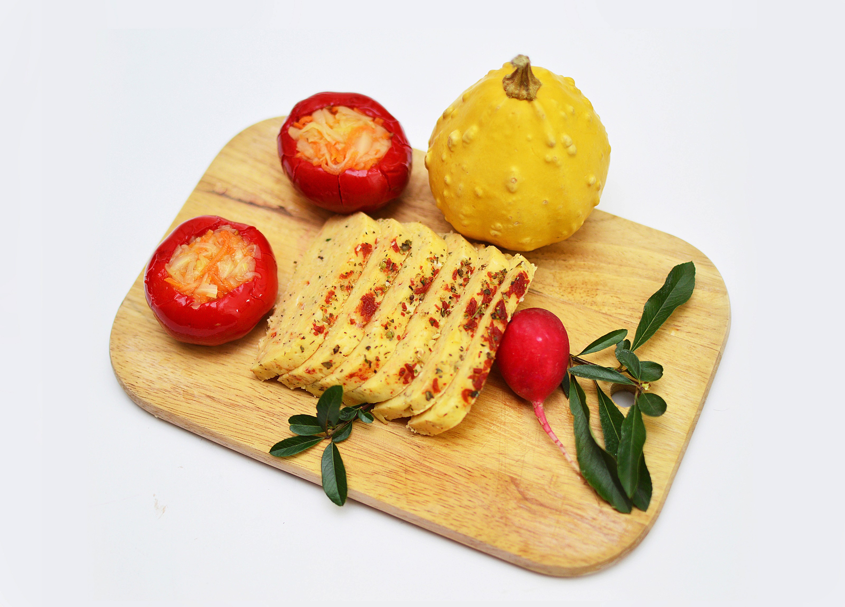Sliced cheese, stuffed peppers, pumpkin, and radish on cutting board HD Wallpaper