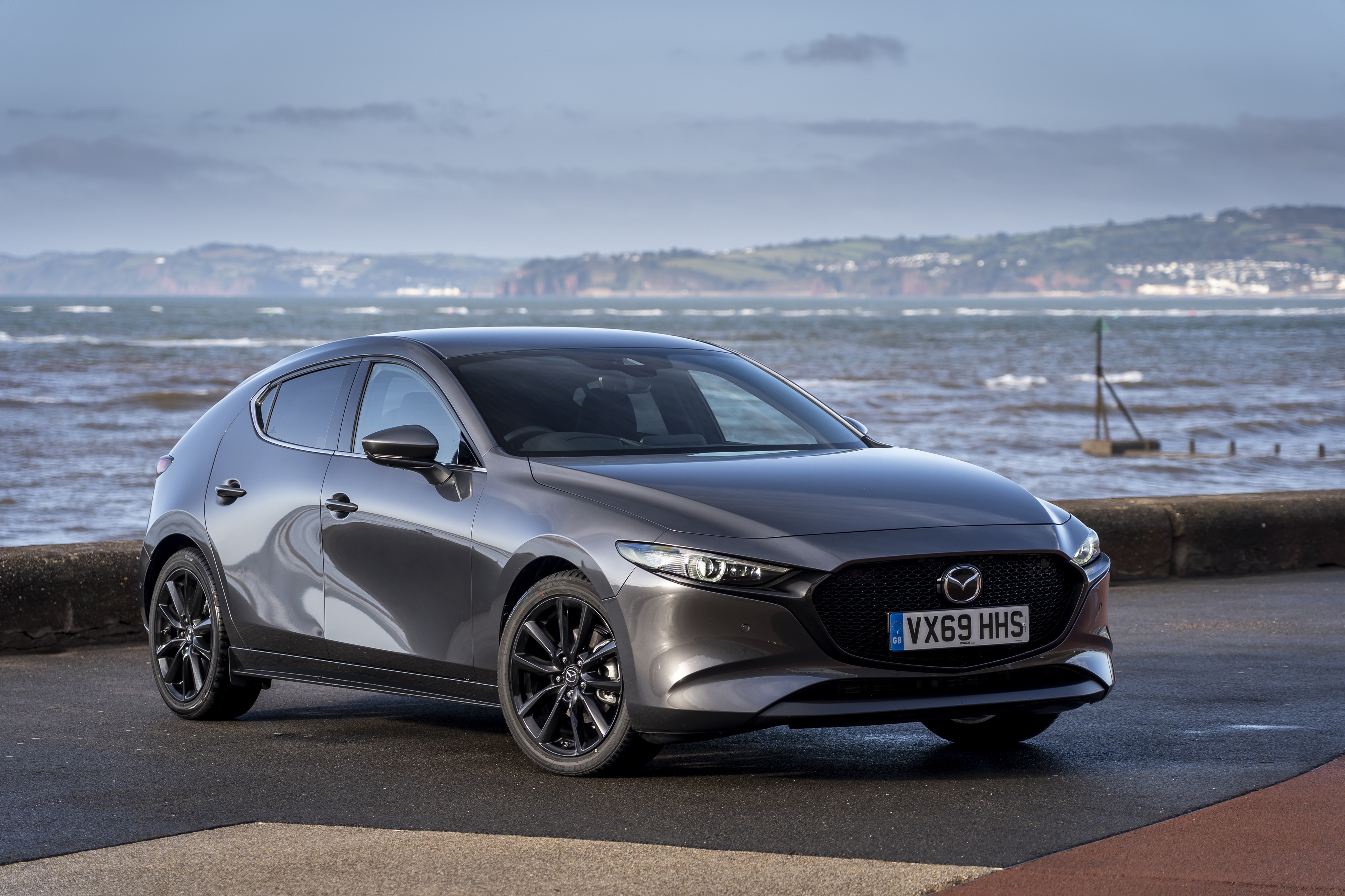 2019 Mazda3 Skyactiv-X AWD Hatchback in Grey HD Wallpaper