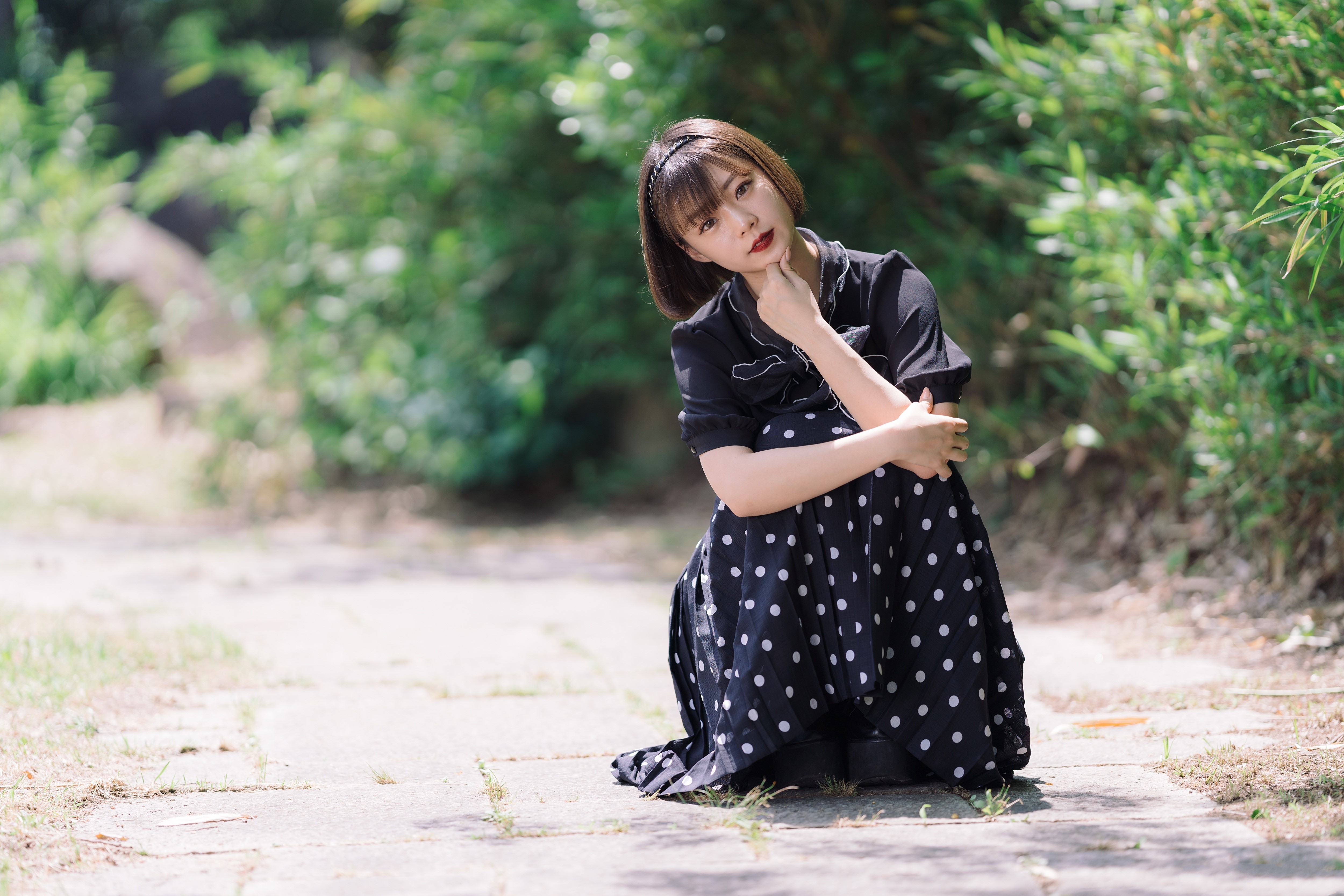 Asian woman with brown hair in a polka dot dress HD Wallpaper