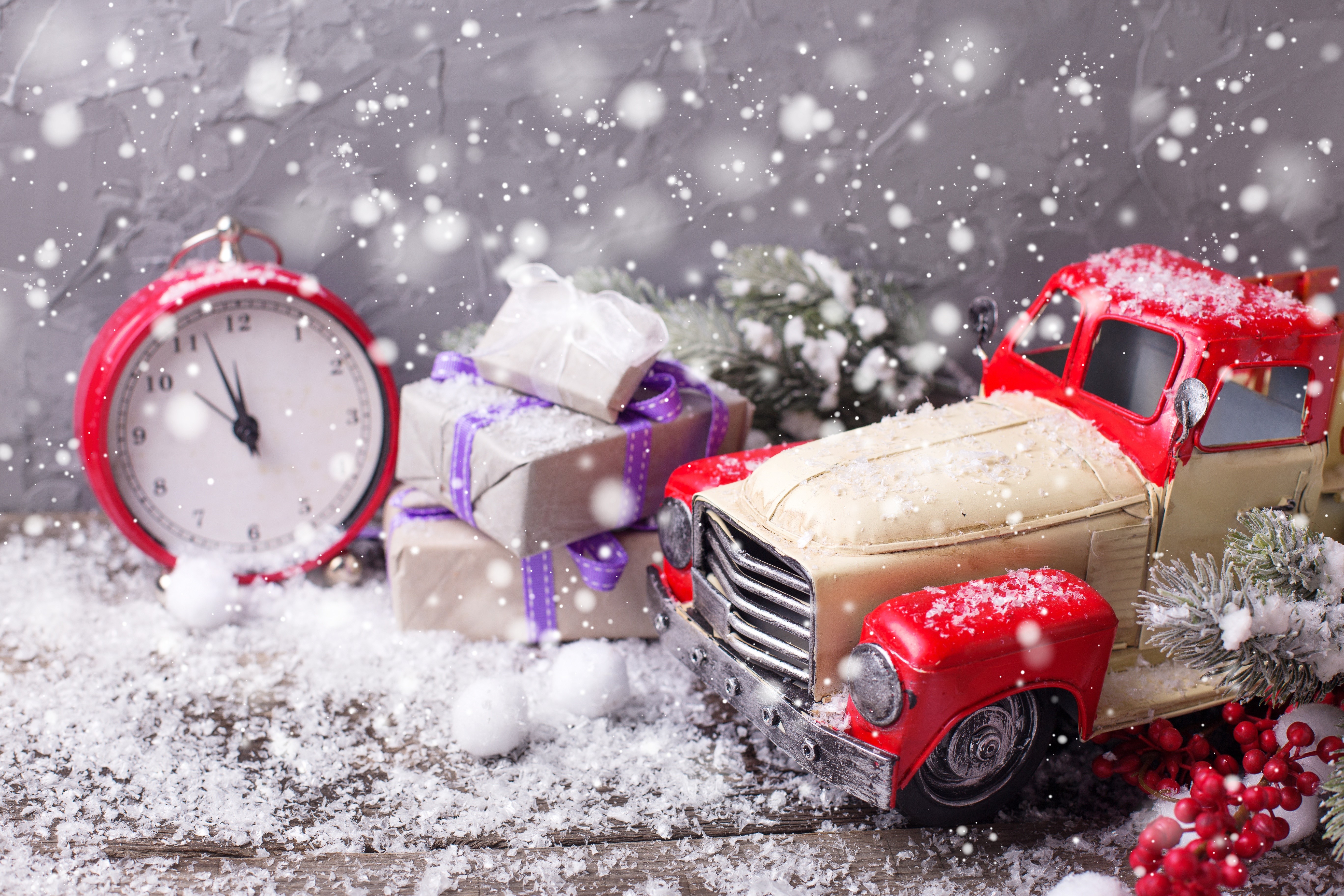Christmas gifts and toy truck with snow and clock HD Wallpaper