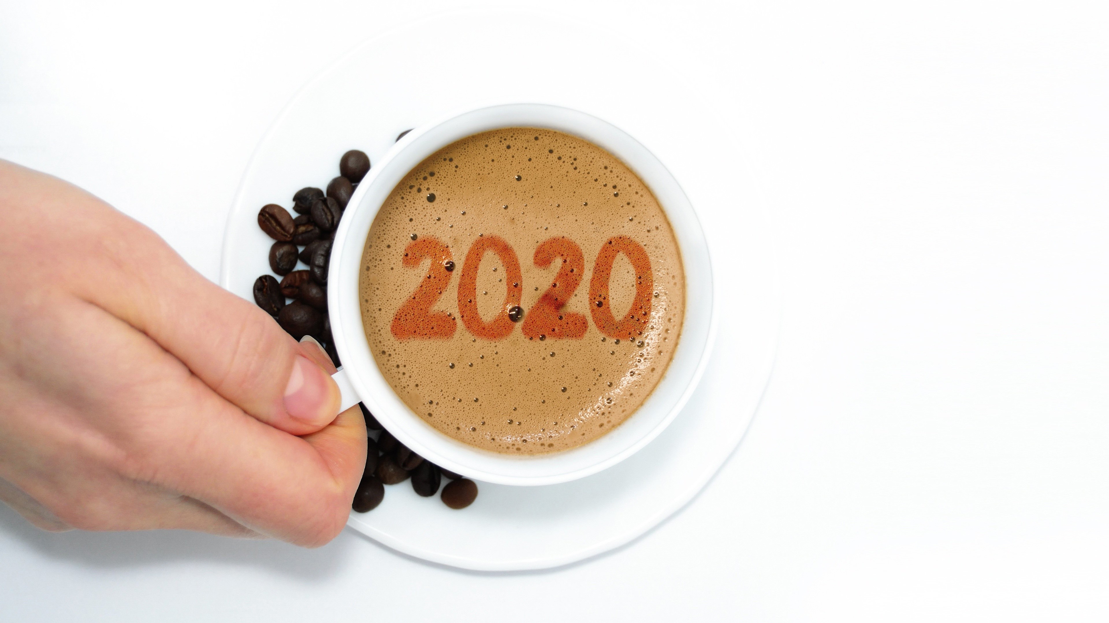 Coffee cup with 2020 design and coffee beans HD Wallpaper