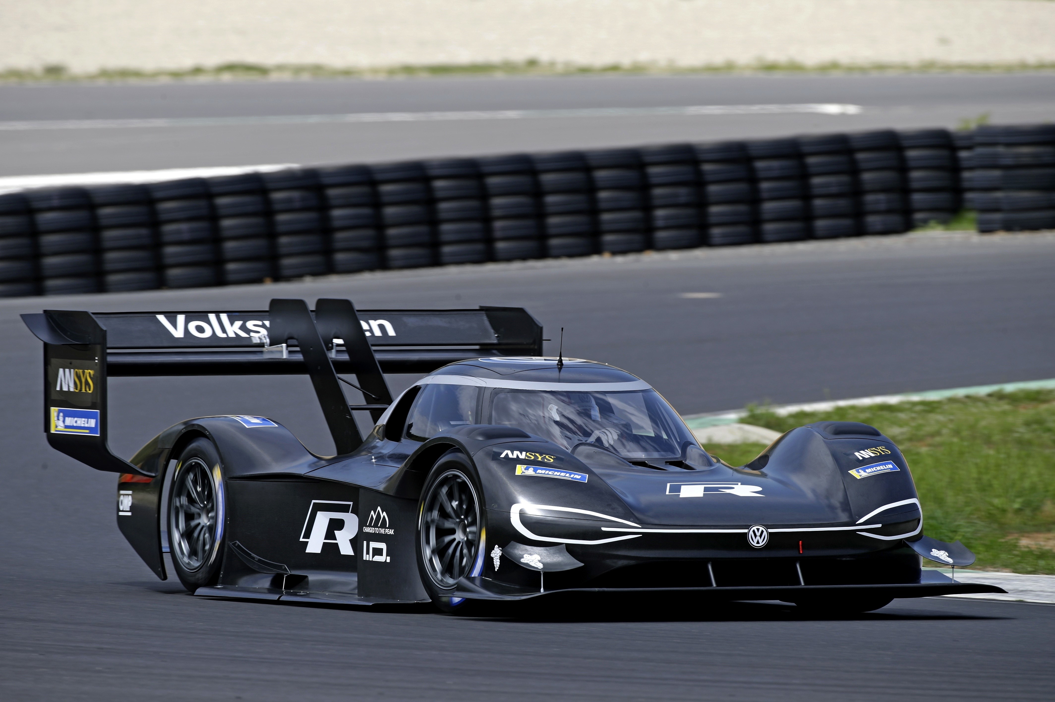 Volkswagen I.D. R prototype race car on track HD Wallpaper