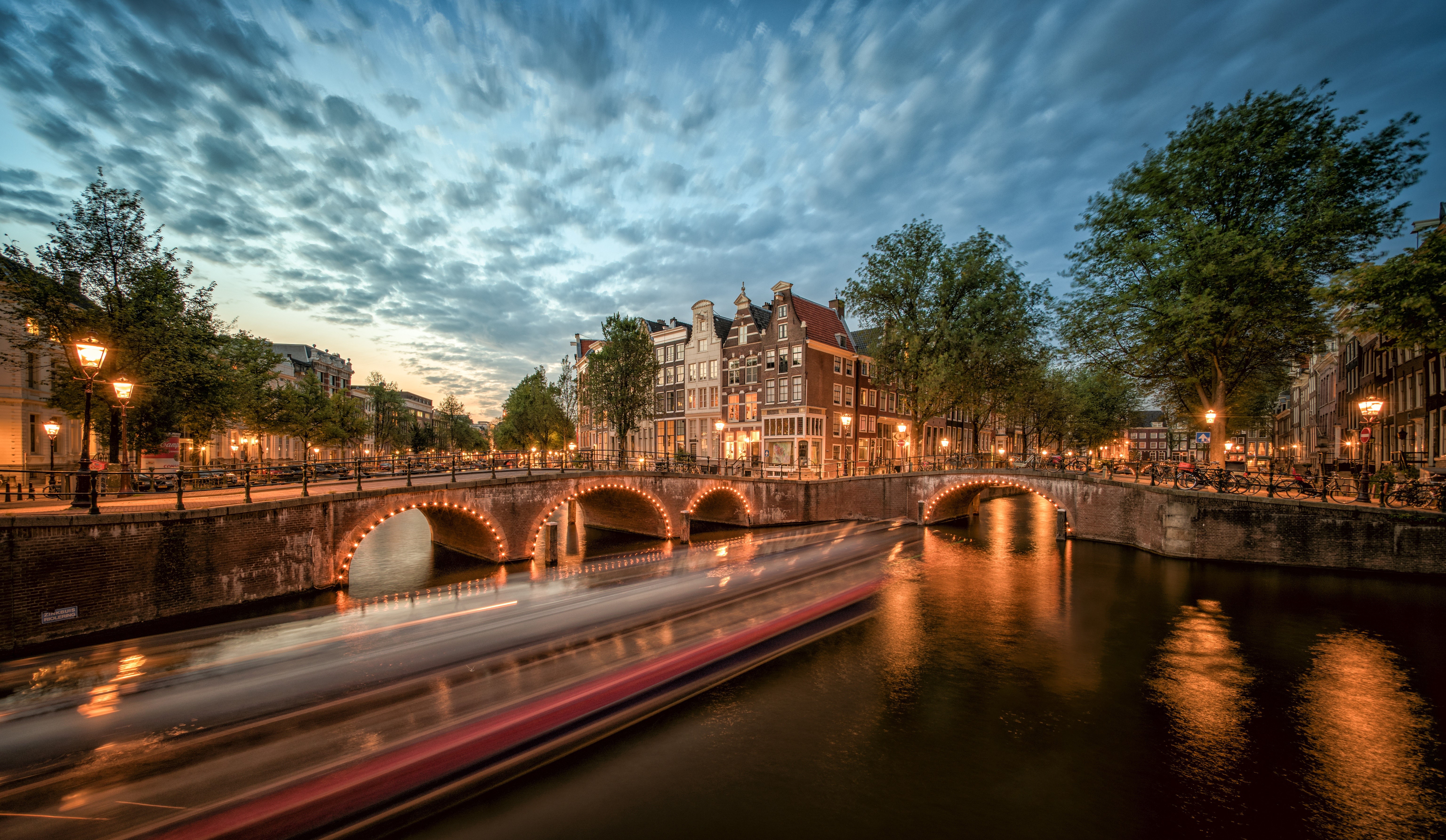 Amsterdam Canal at Dusk with Bridges and Boat HD Wallpaper