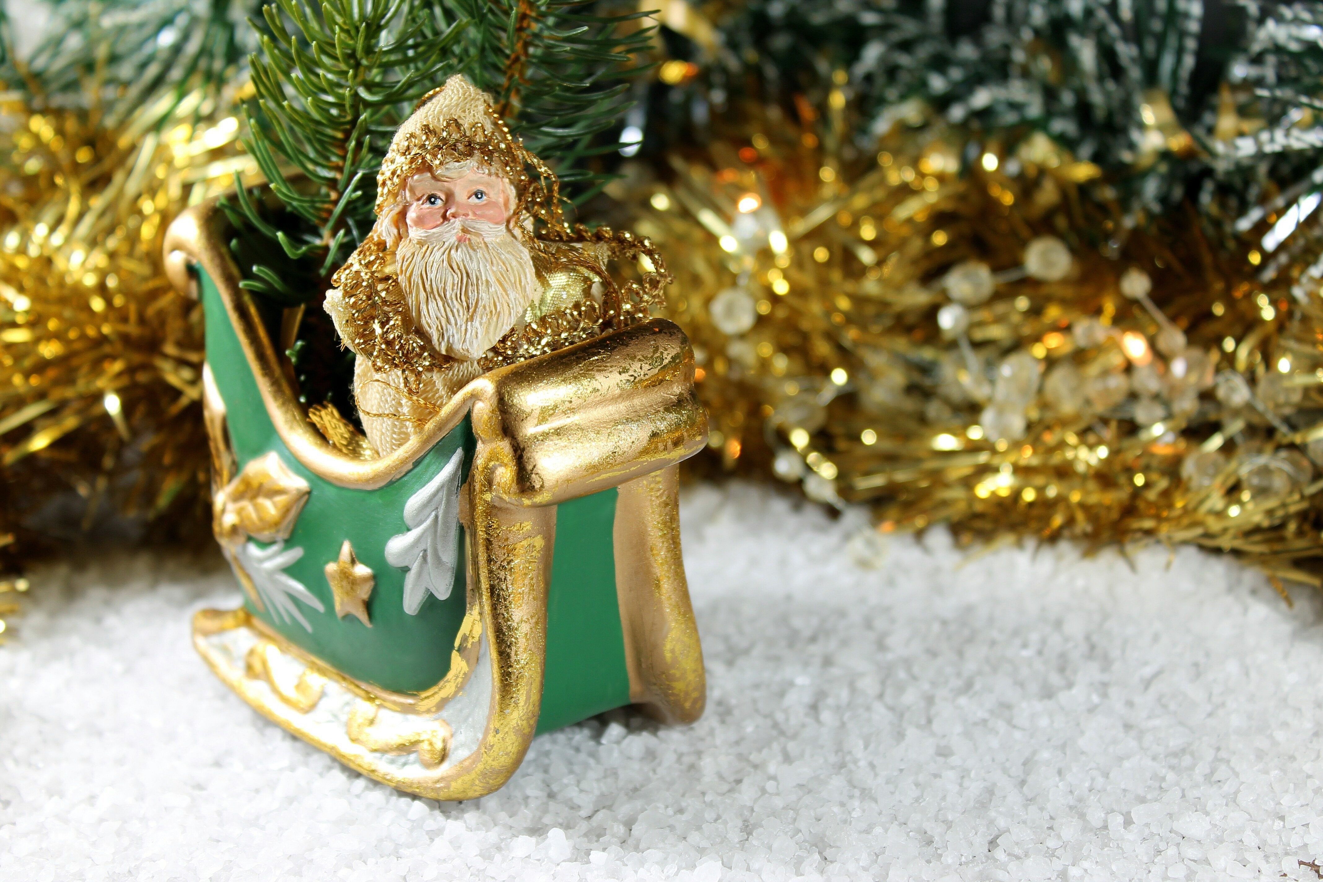 Santa Claus in a Sled with Christmas Decorations HD Wallpaper