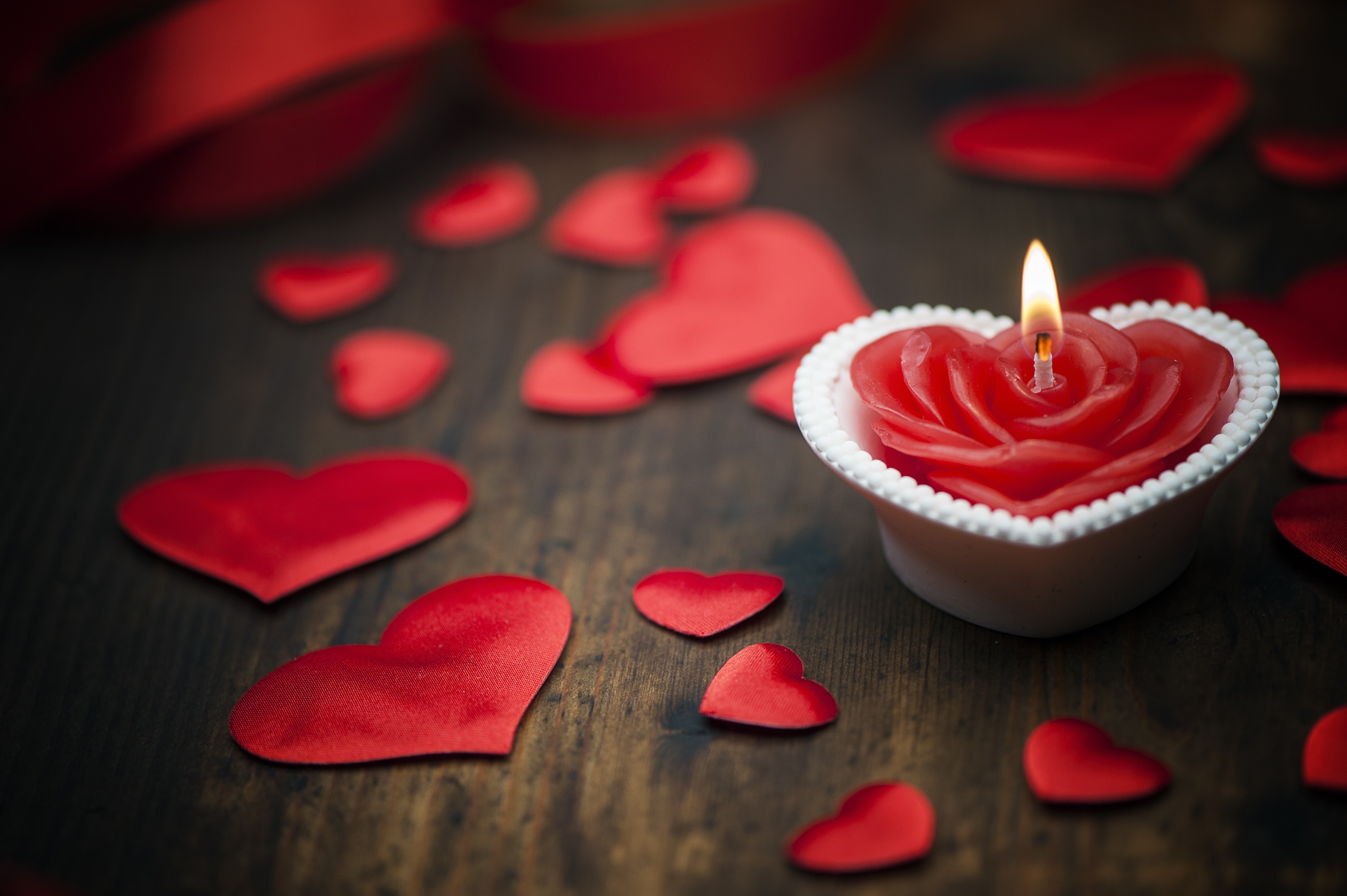 Heart-shaped candle with red hearts HD Wallpaper
