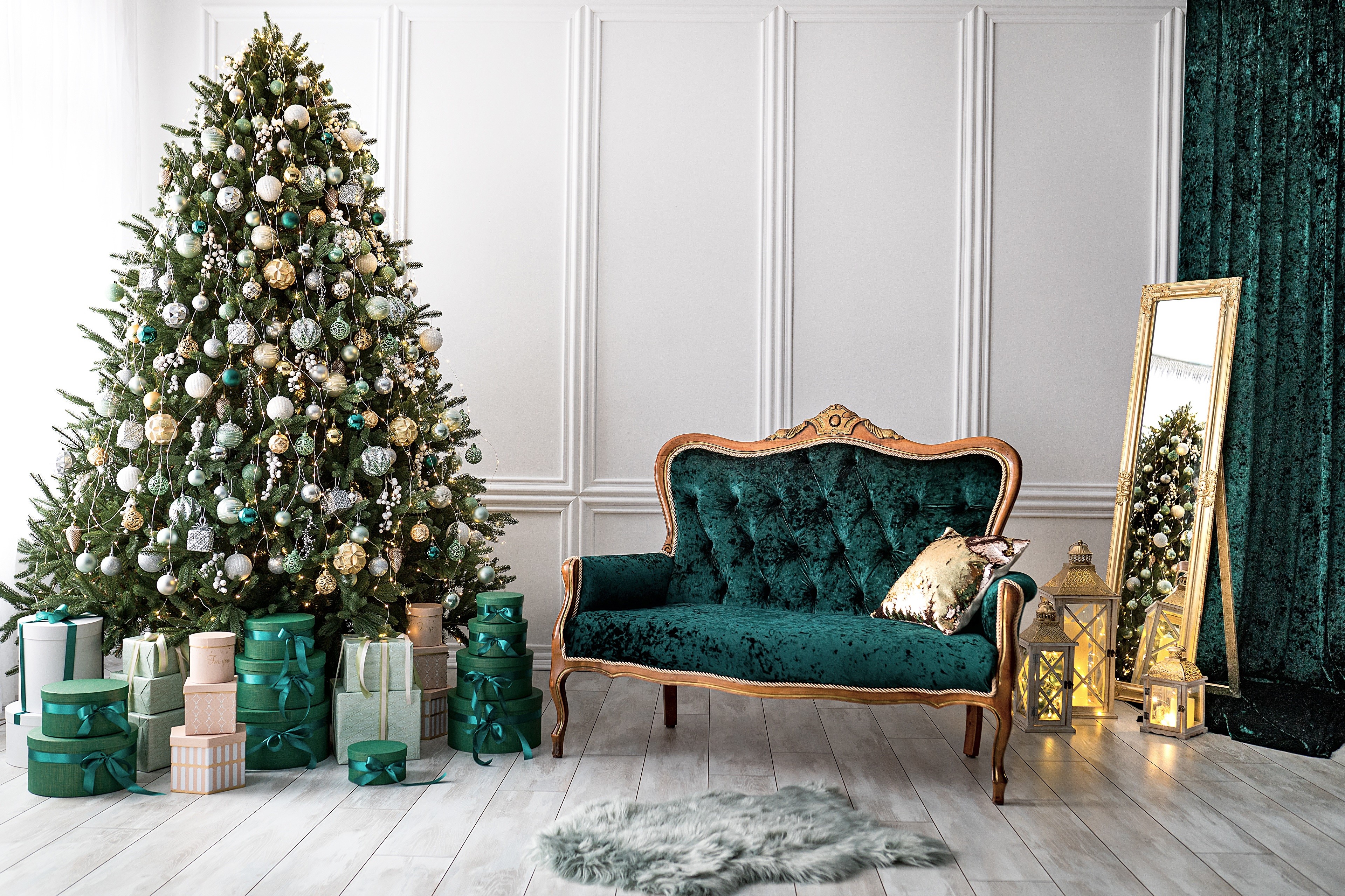 Christmas tree with gifts and sofa in a room HD Wallpaper