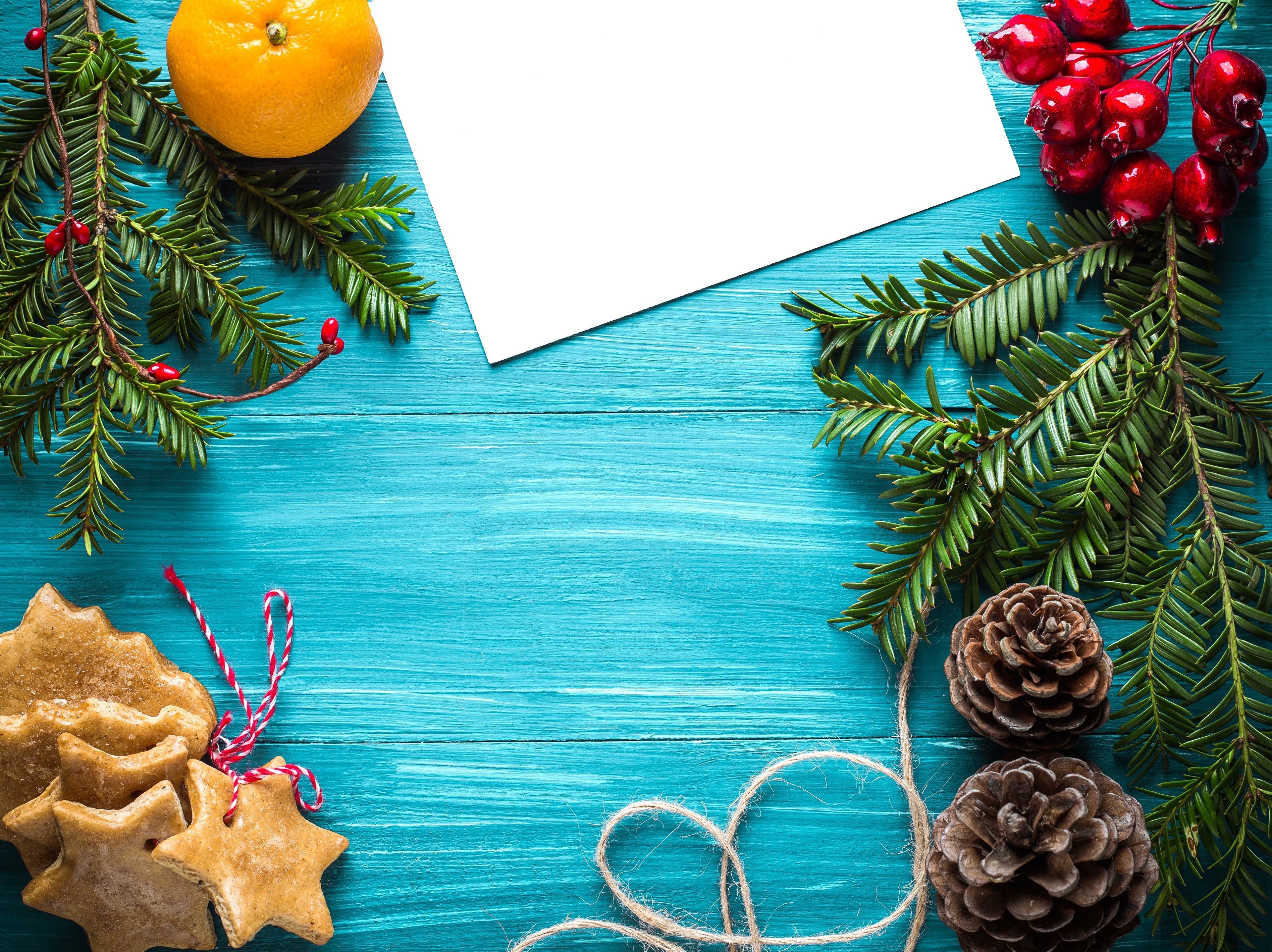 Christmas decorations with orange, cookies, and pine cones HD Wallpaper