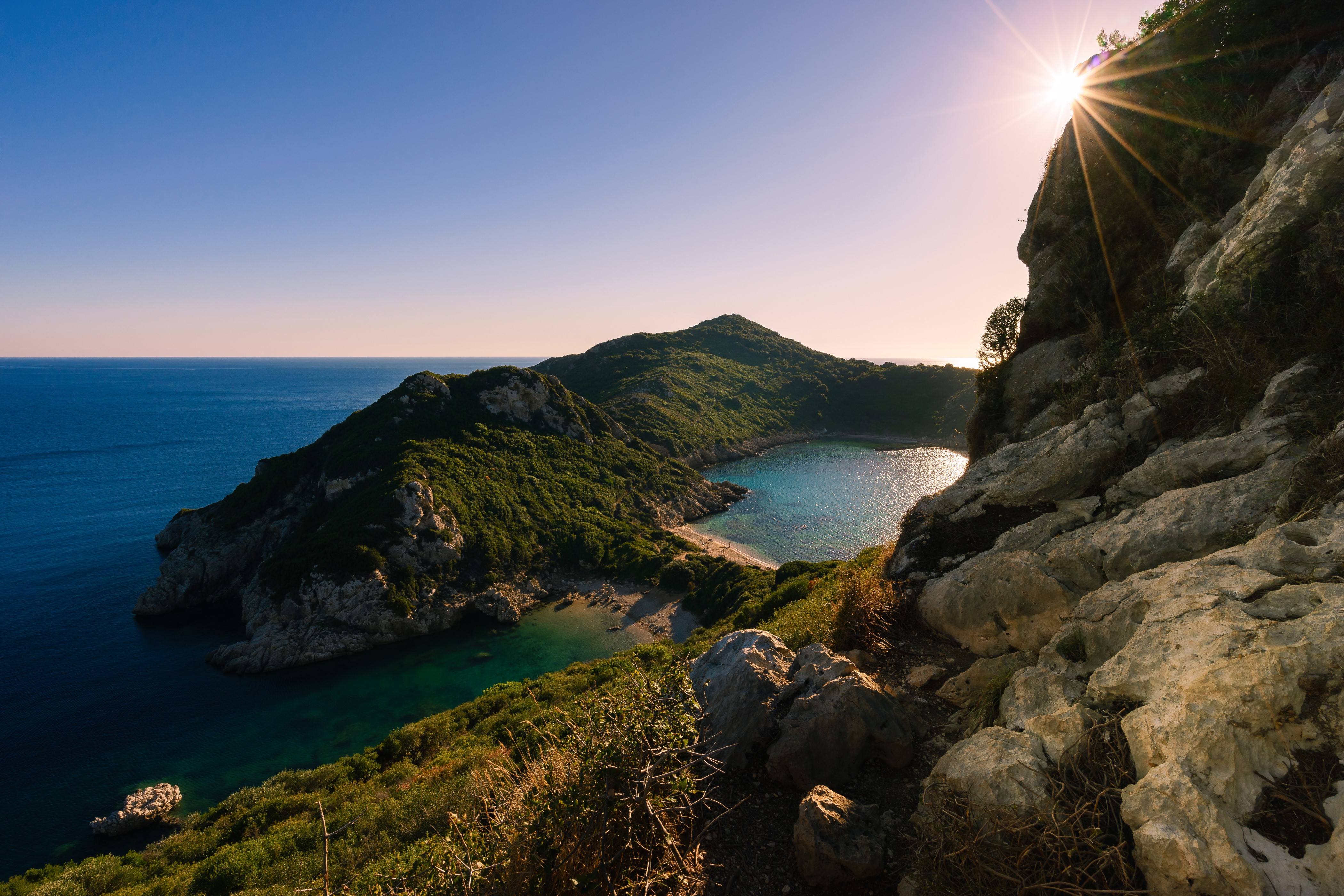 4K Korfu Greece Coastline with Sun Rays HD Wallpaper