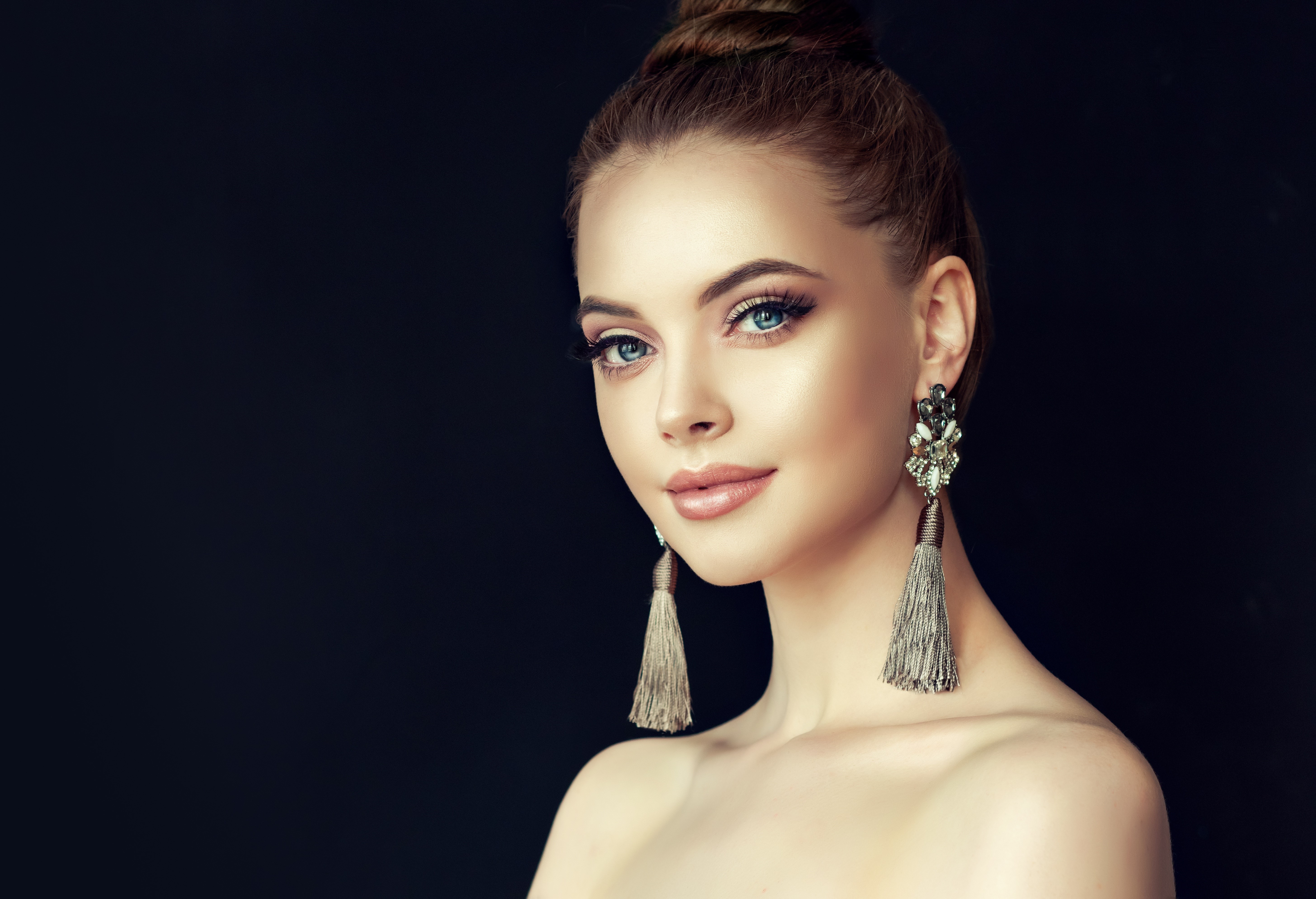Elegant Model with Earrings in 4K HD Wallpaper
