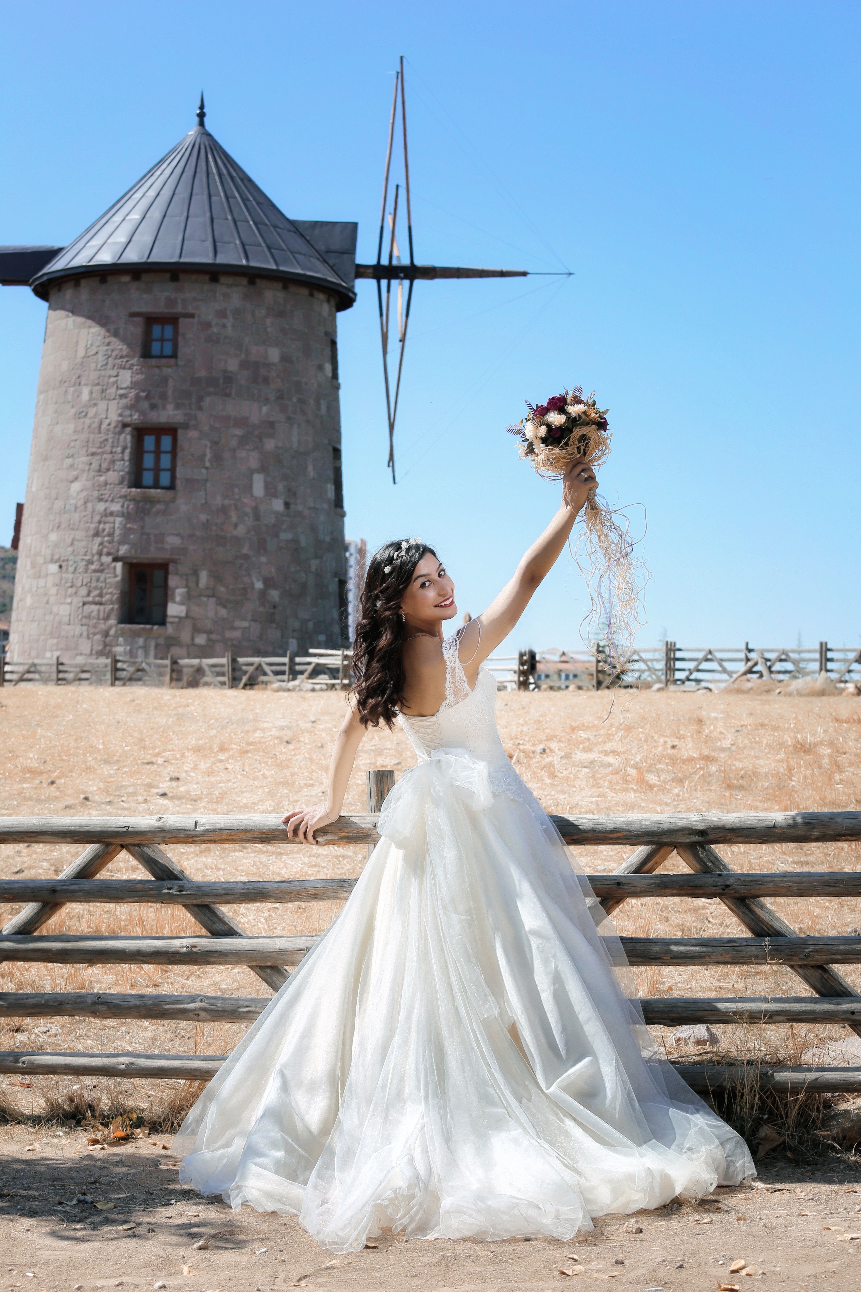 Bride with Bouquet in front of a Mill HD Phone Wallpaper