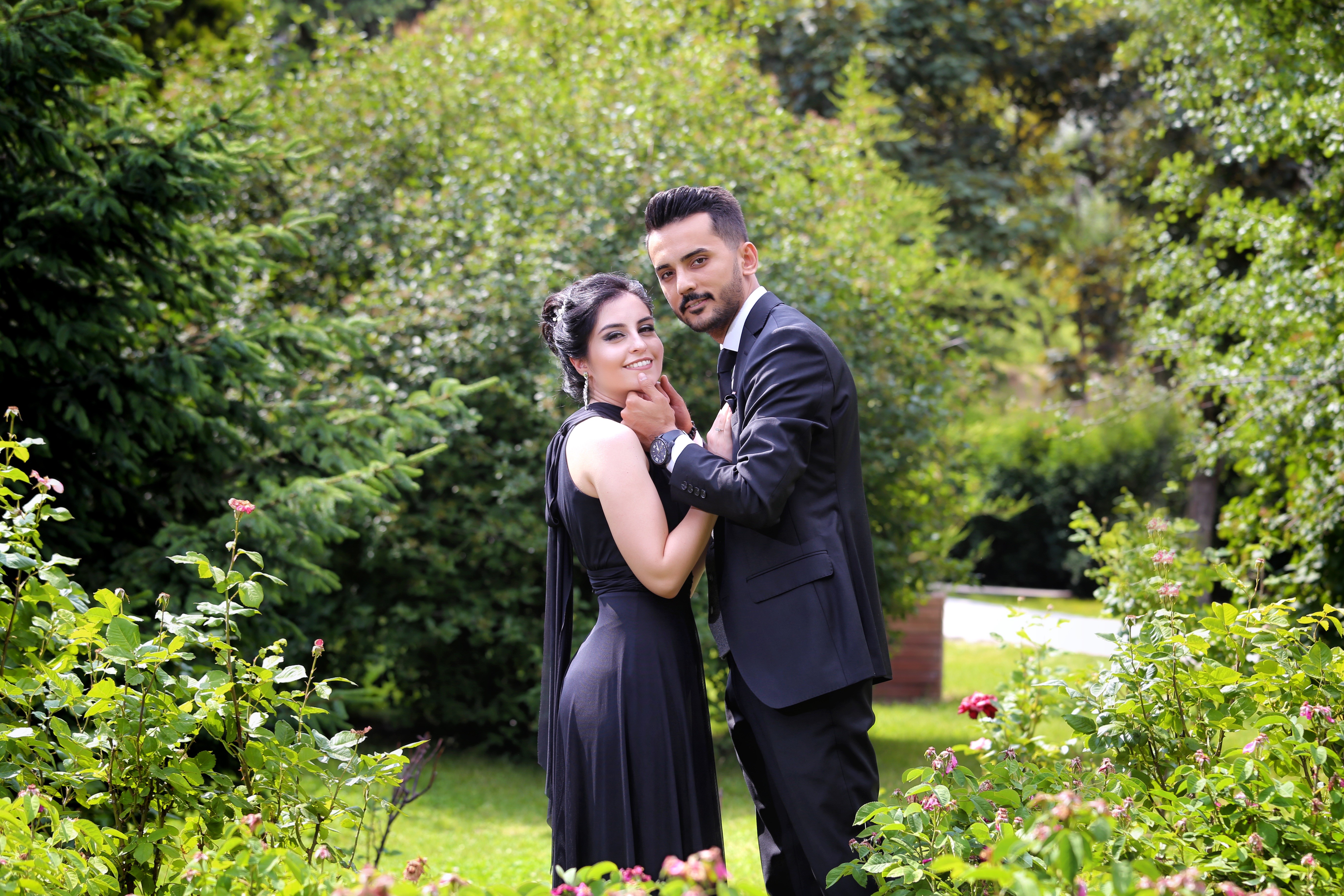 Couple in love in a garden HD Wallpaper