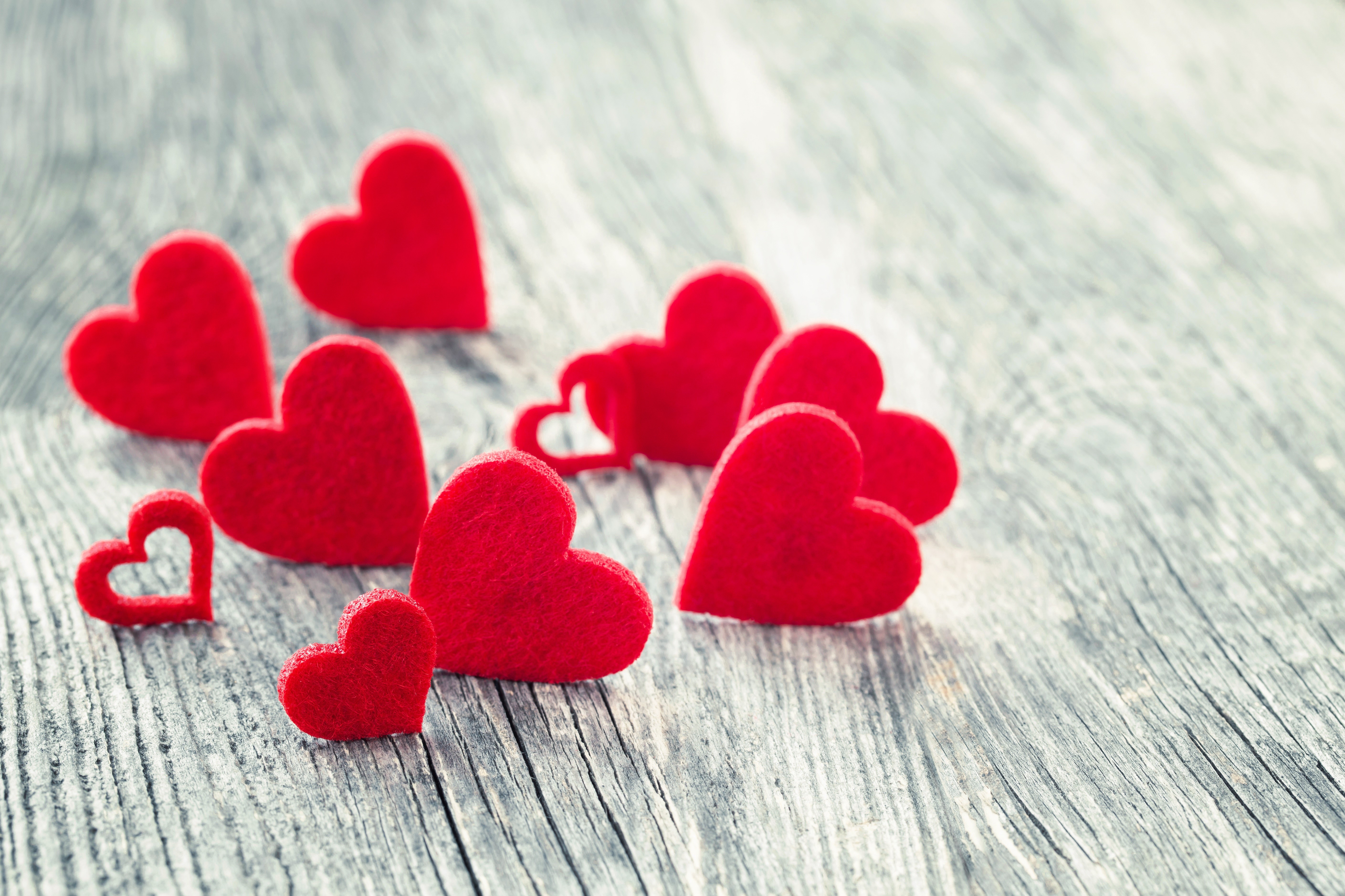 Red Hearts on Wooden Surface HD Wallpaper