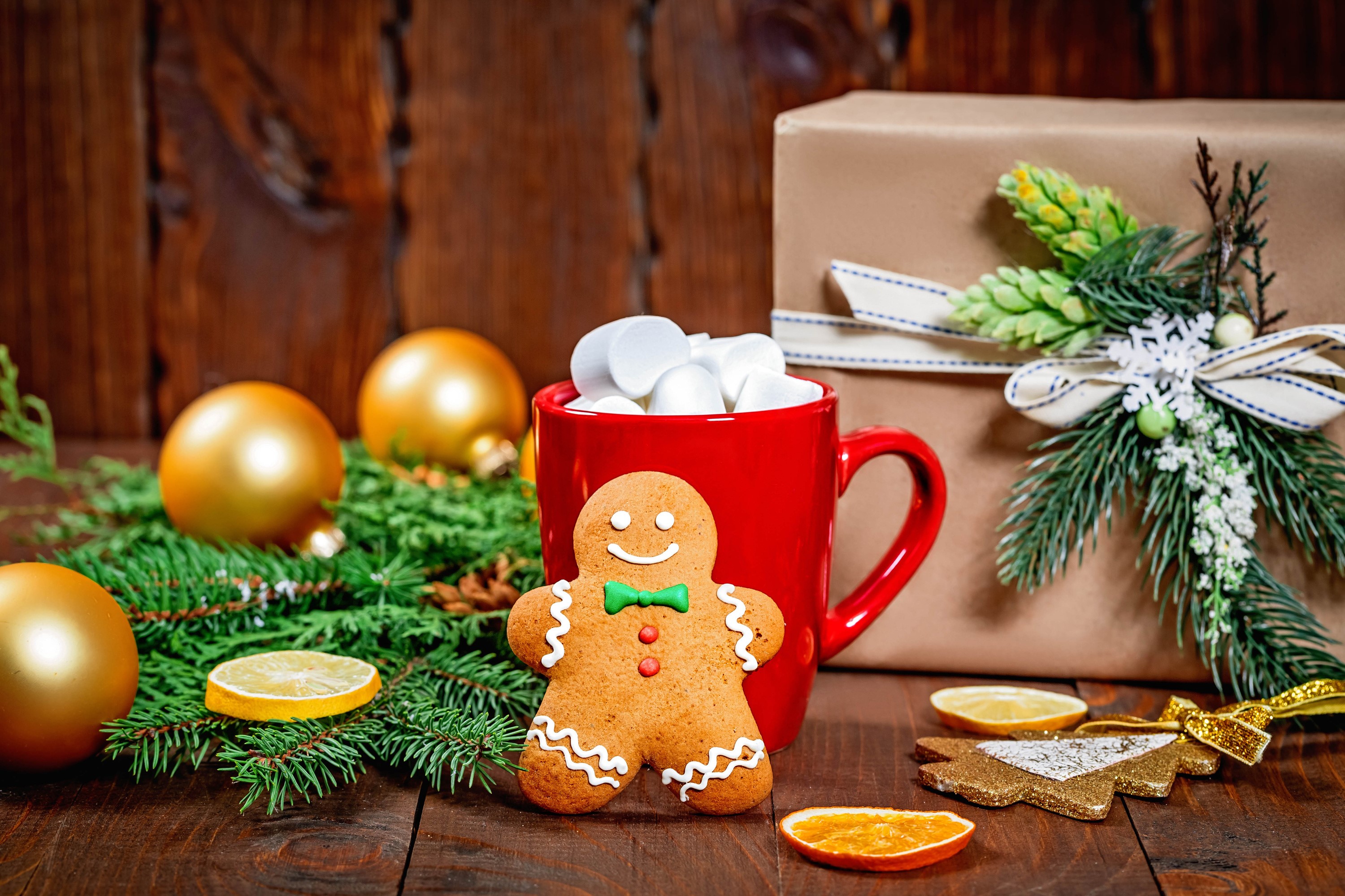 Christmas gingerbread man with hot chocolate and gifts HD Wallpaper