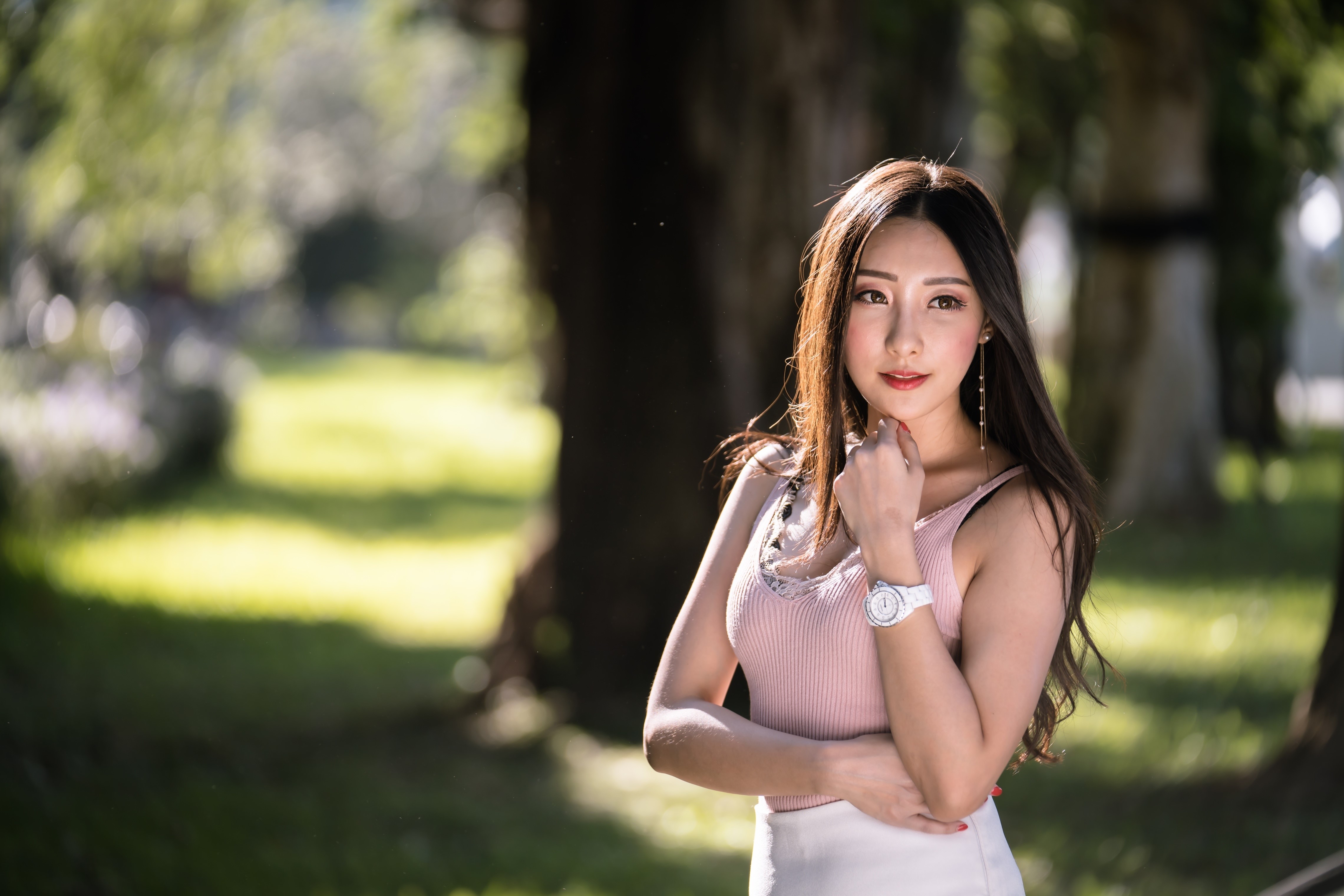 Asian woman with brown hair in a park HD Wallpaper