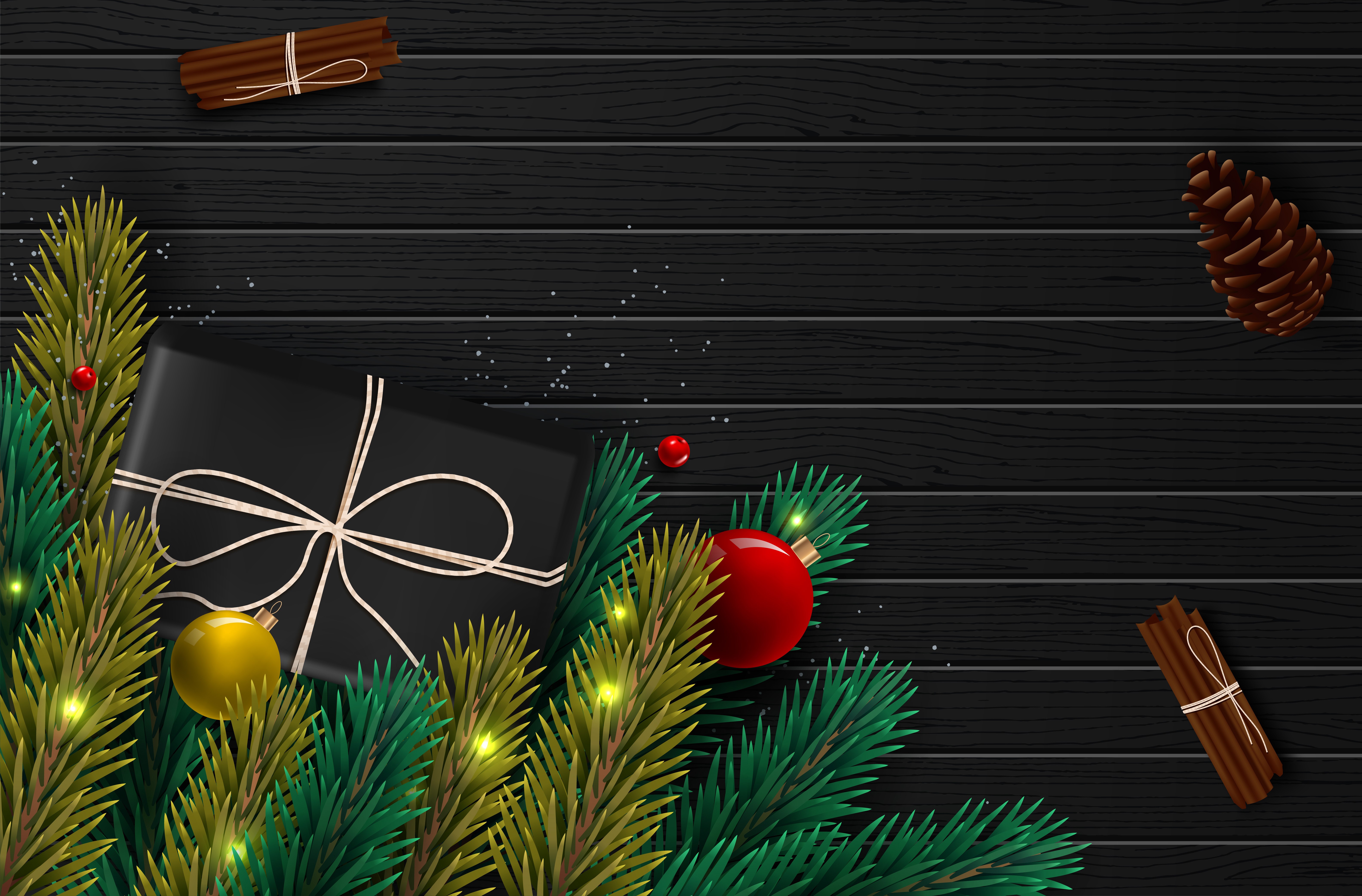 Christmas gift with pine cones and cinnamon sticks HD Wallpaper