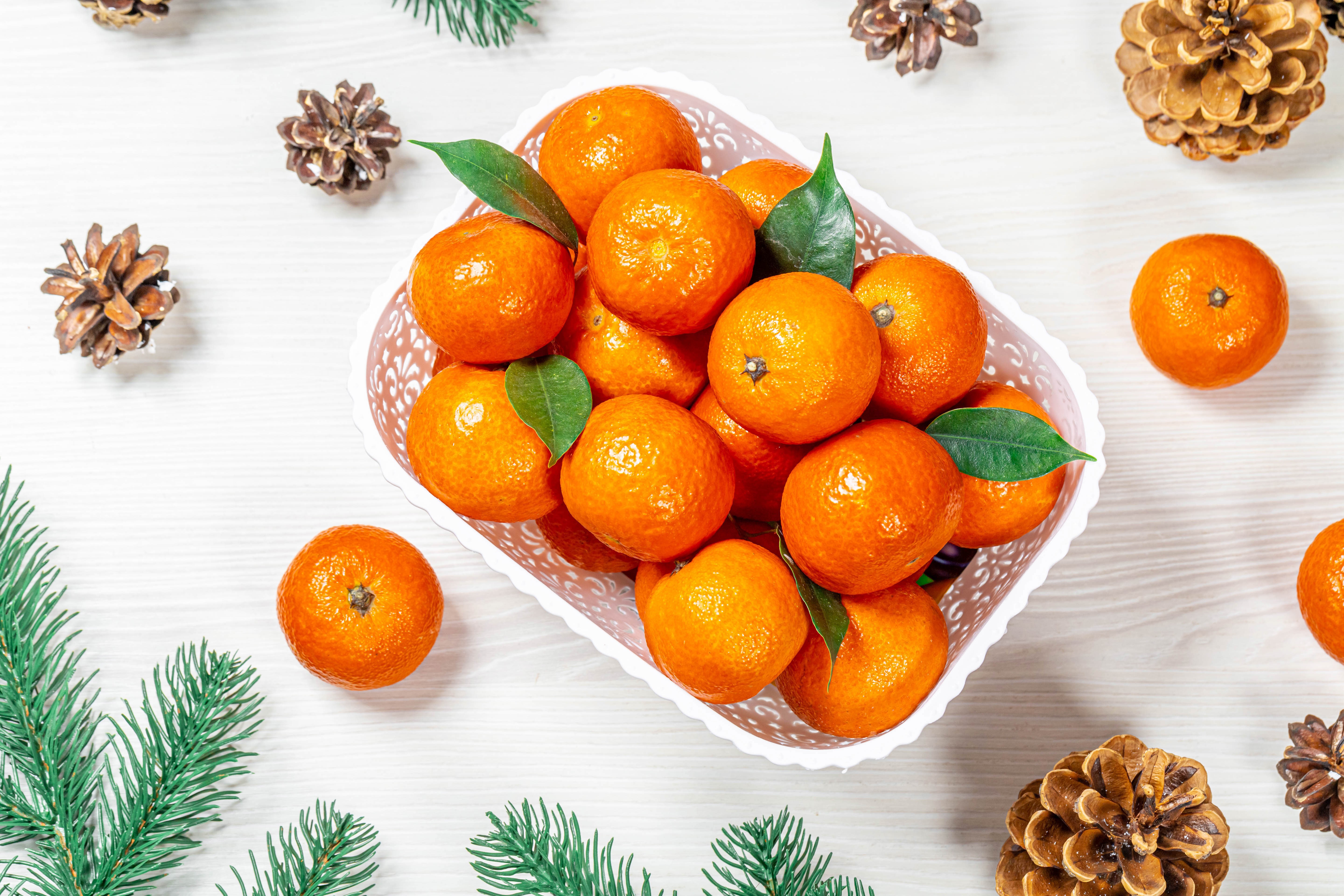 Christmas Mandarins with Pine Cones and Fir Branches HD Wallpaper
