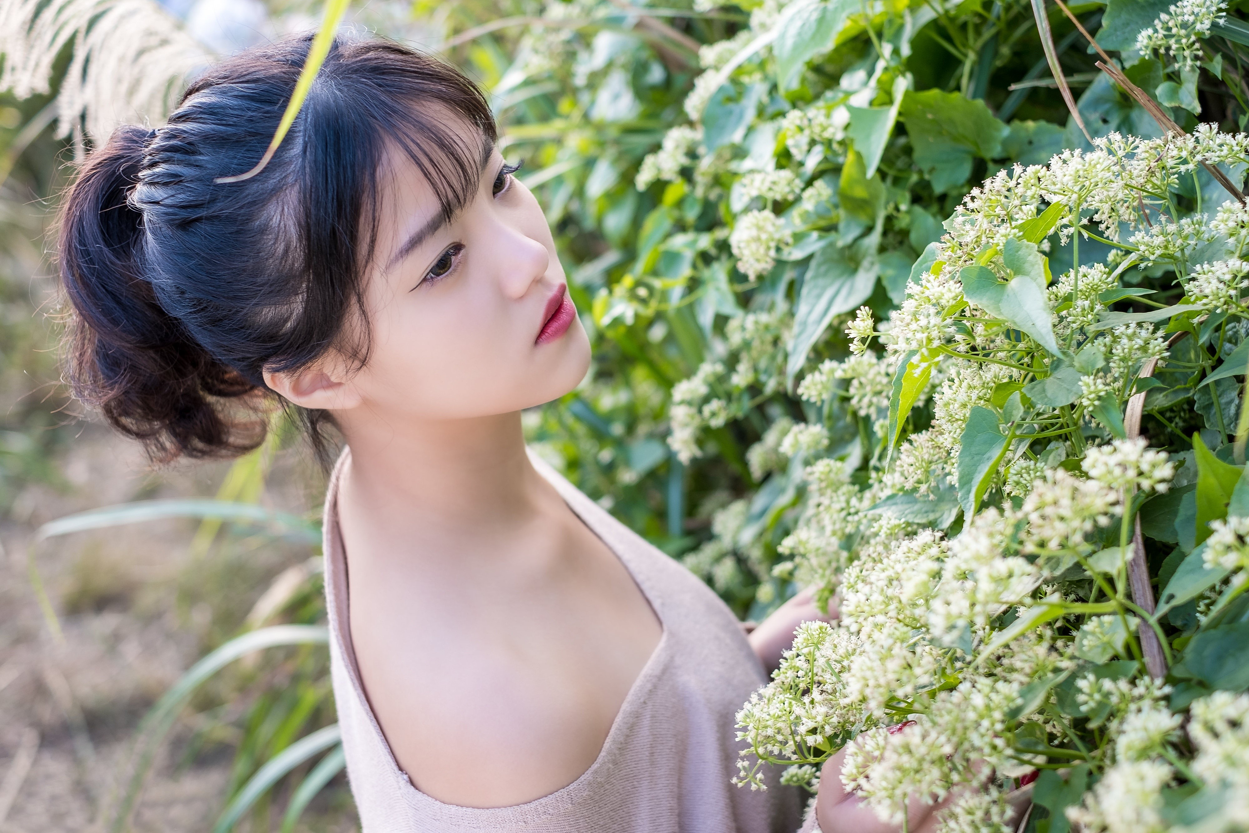 Brunette girl with flowers HD Wallpaper